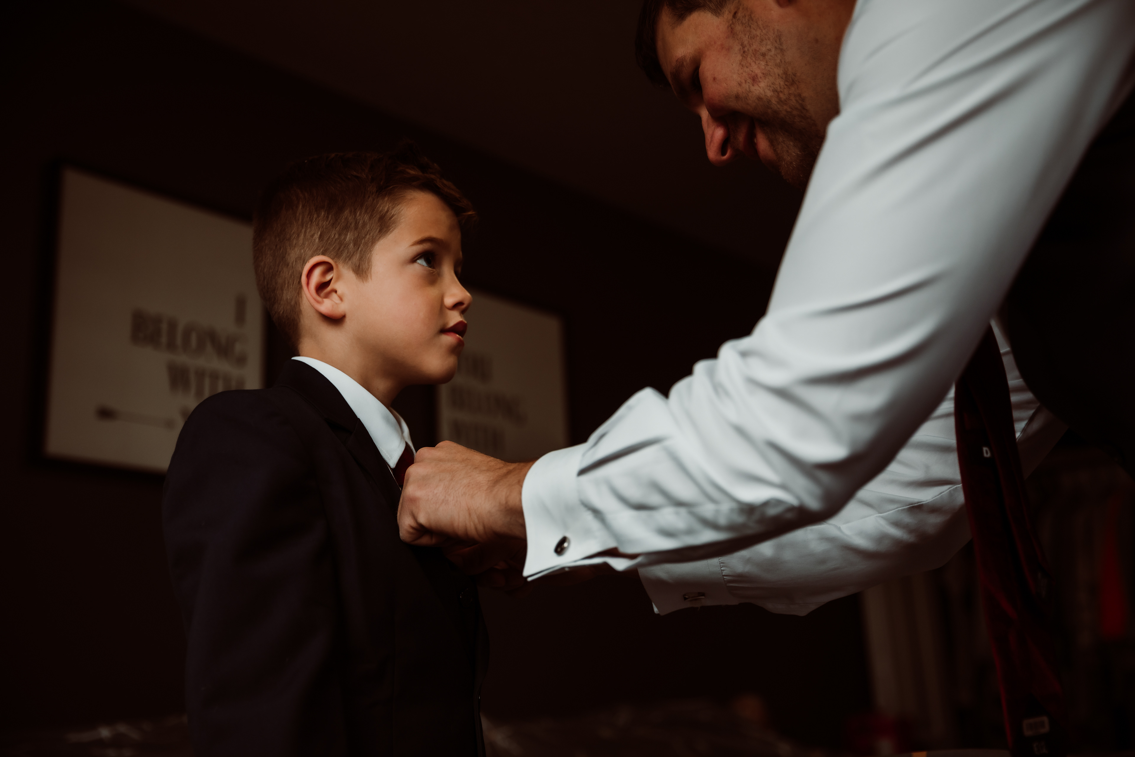 Groom helping son get ready in edmonton