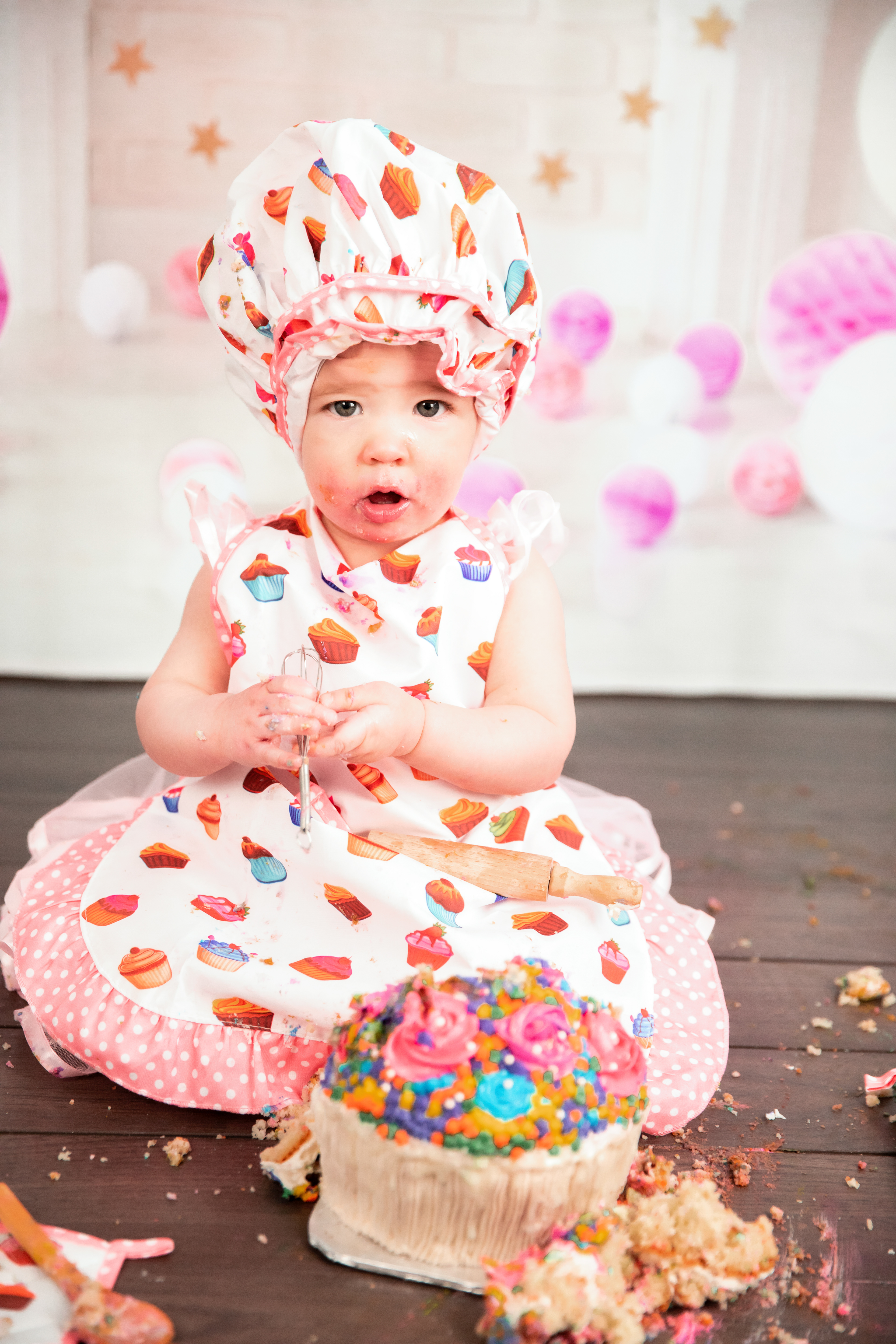 baby covered in cake 