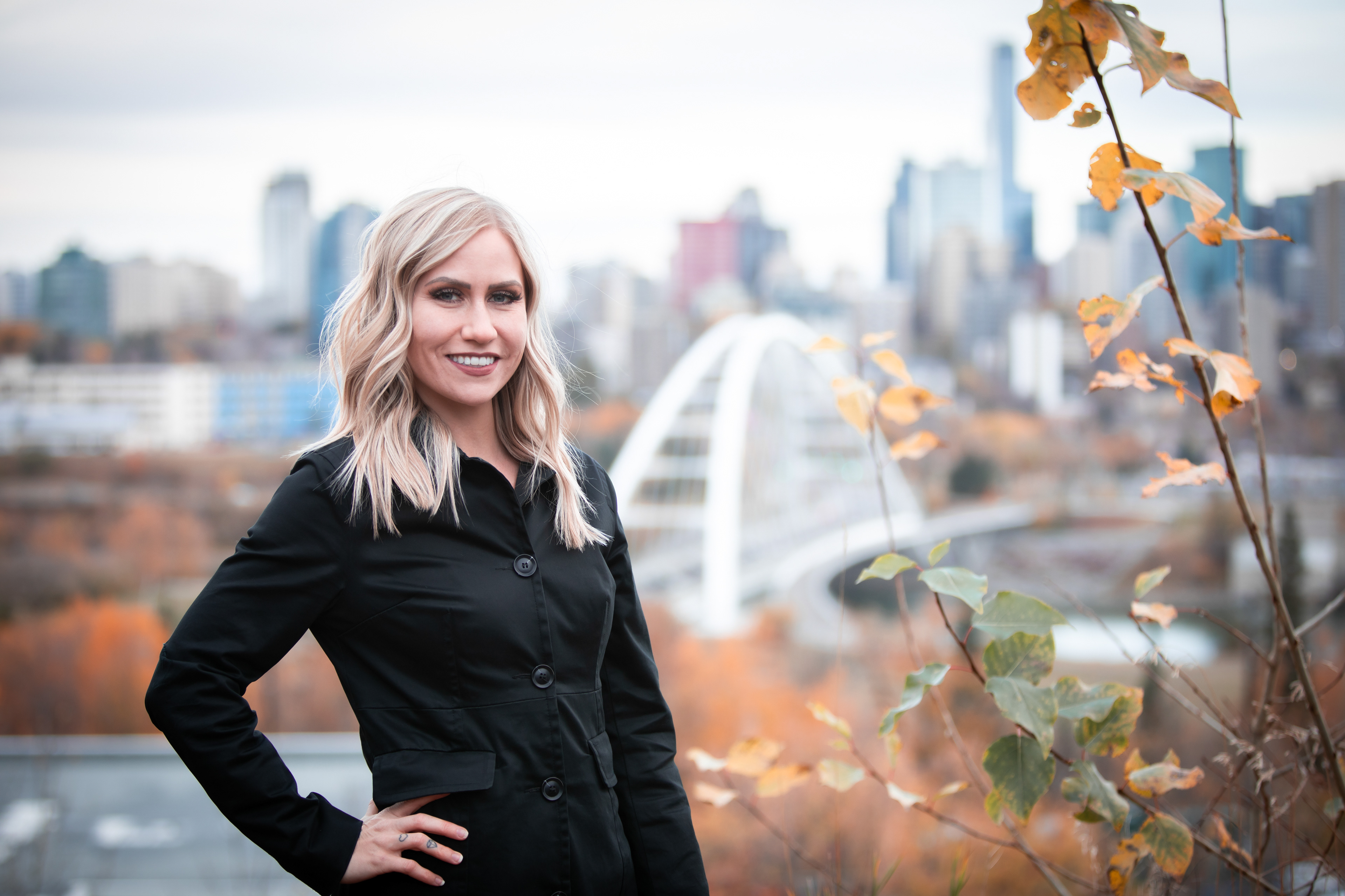 headshot over the city of edmonton