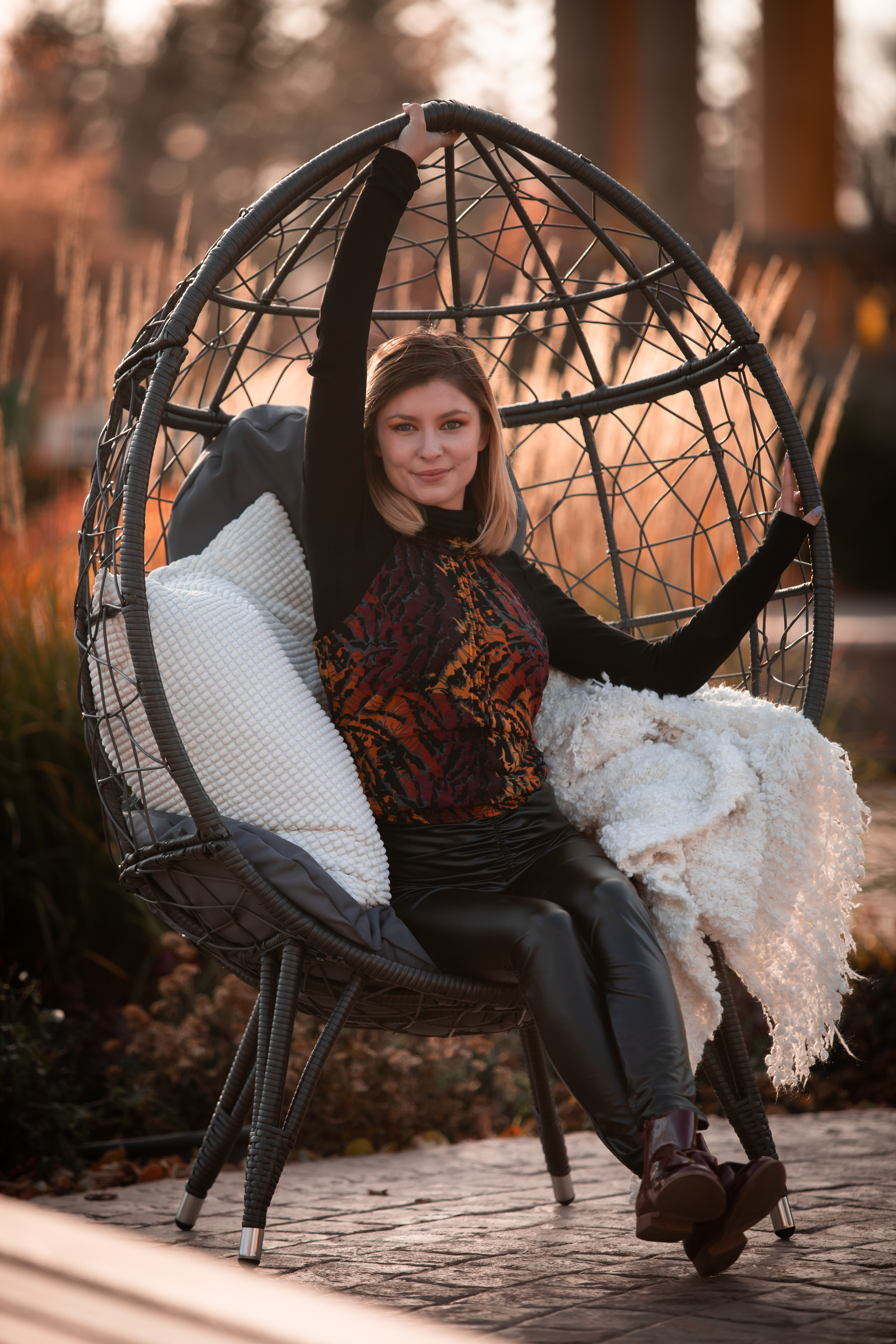 girl in an egg chair 