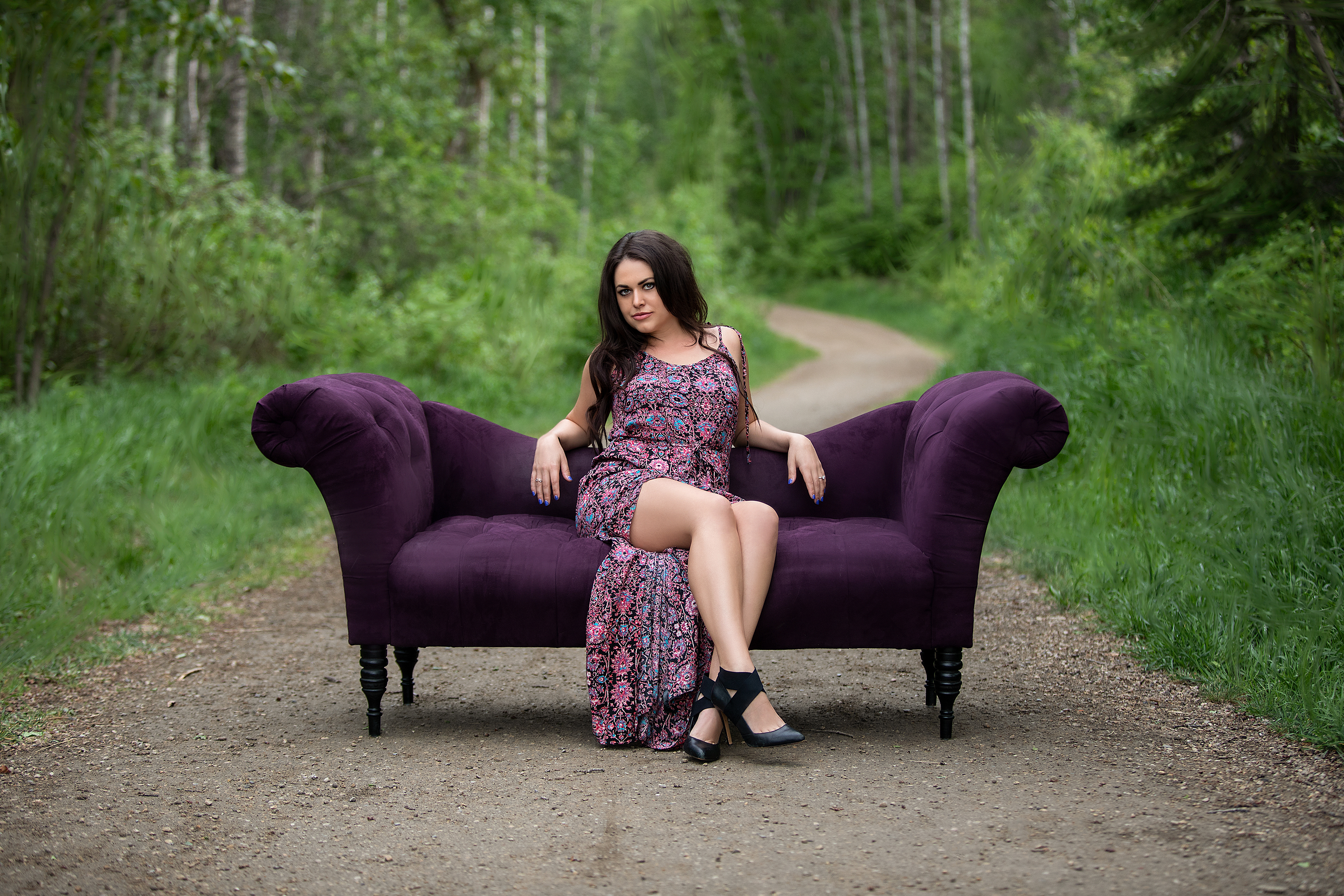 model on a couch outside