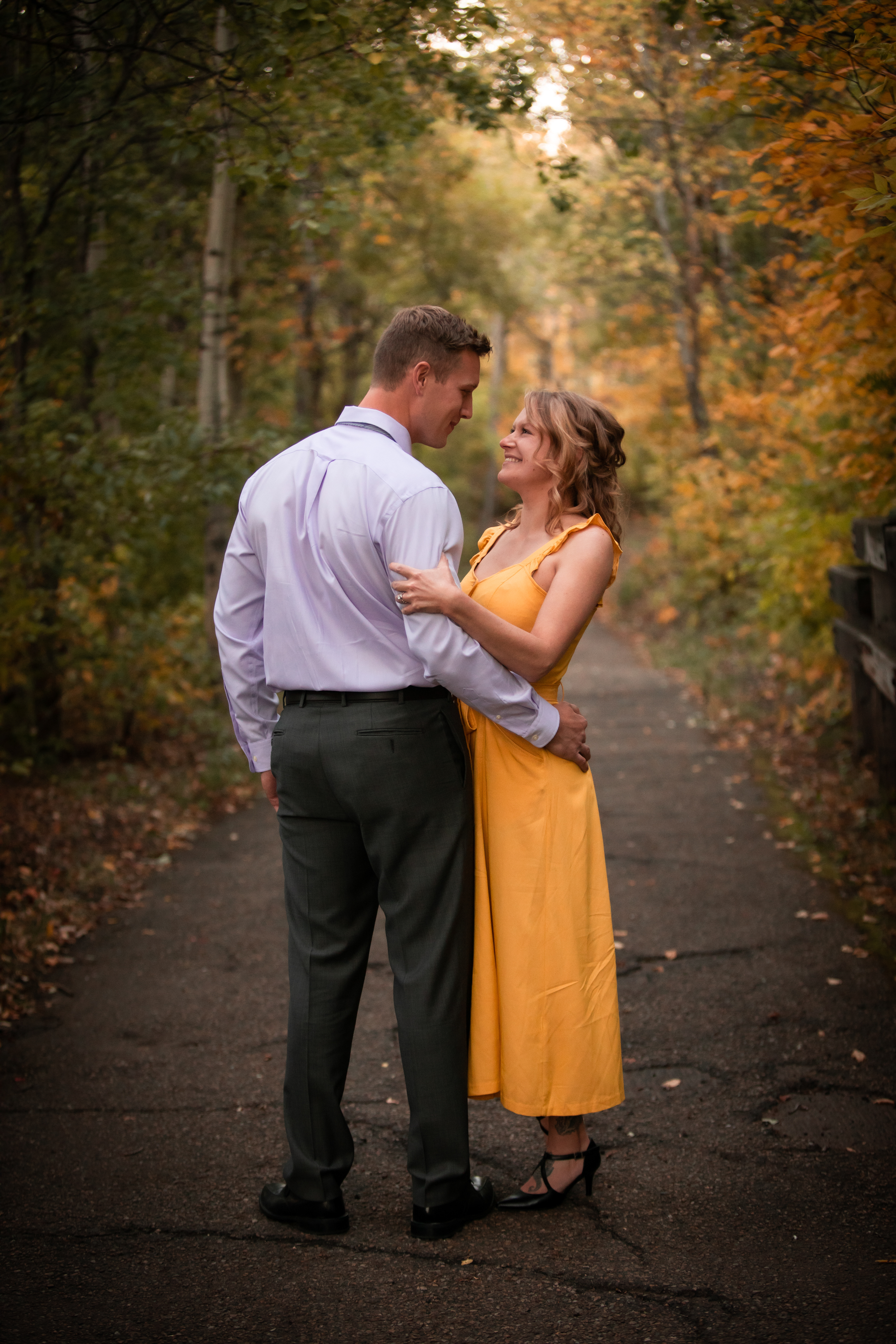 Couple laughing in each others arms