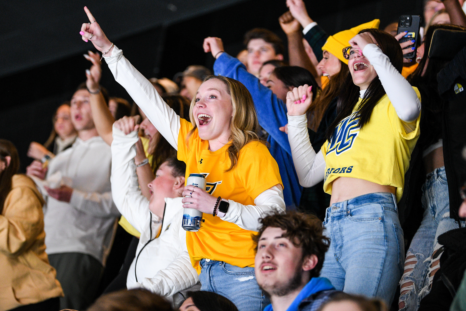 Merrimack College fans cheering for the Warriors as they win the semi finals against UMass Lowell.