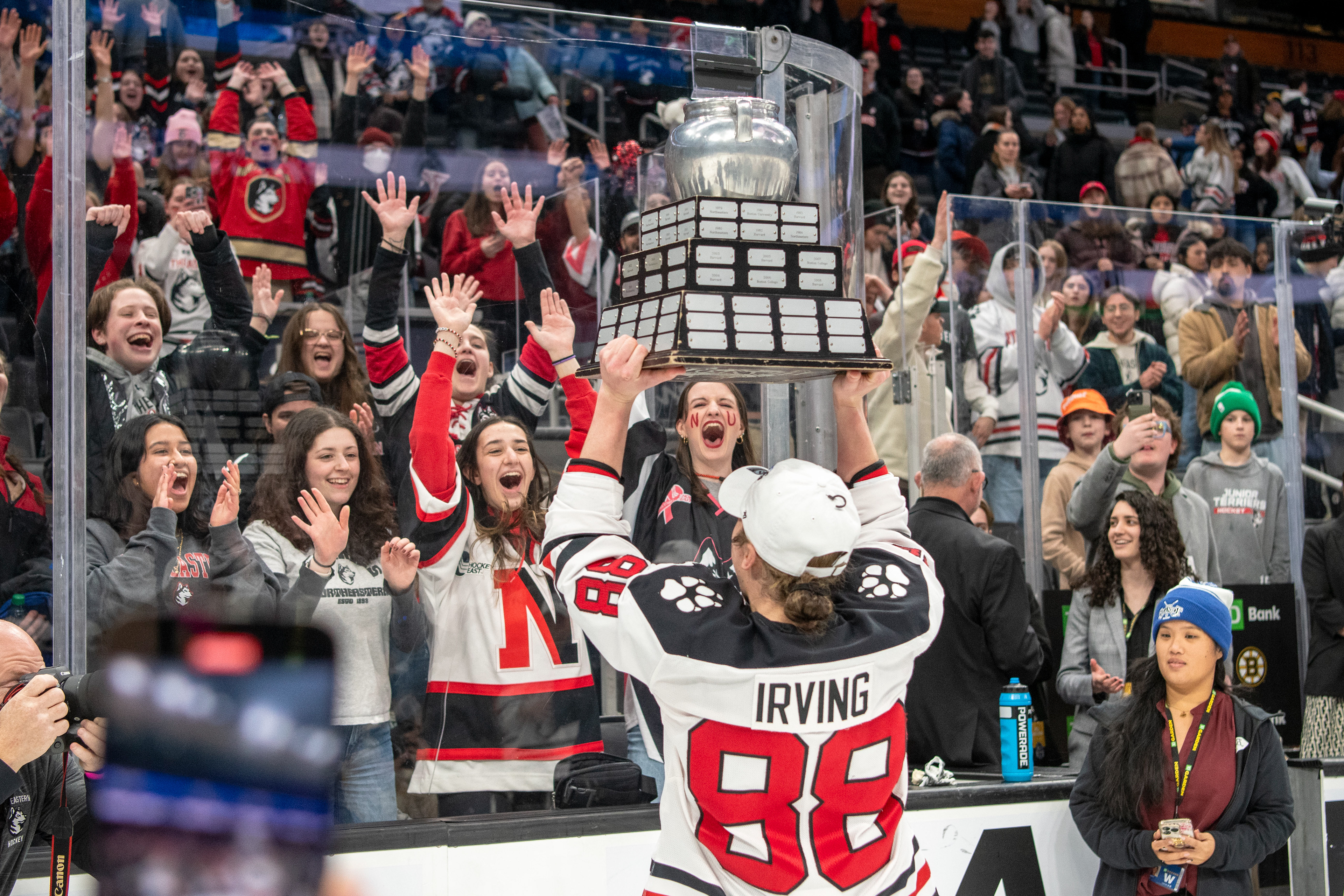 Northeastern Women's Ice Hockey 2025 : Skylar Irving celebrates Beanpot 3-peat with student section