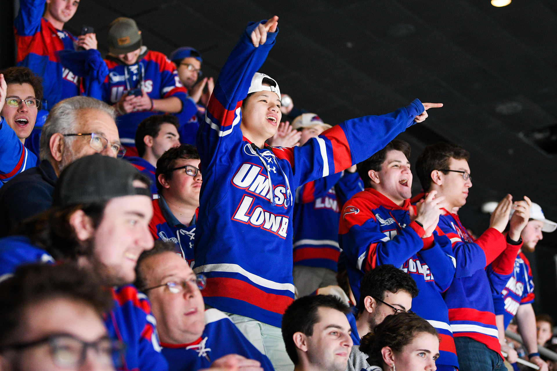 UMass Lowell fans cheering on the Riverhawks as they score a game-tying point against Merrimack College in the semi finals.