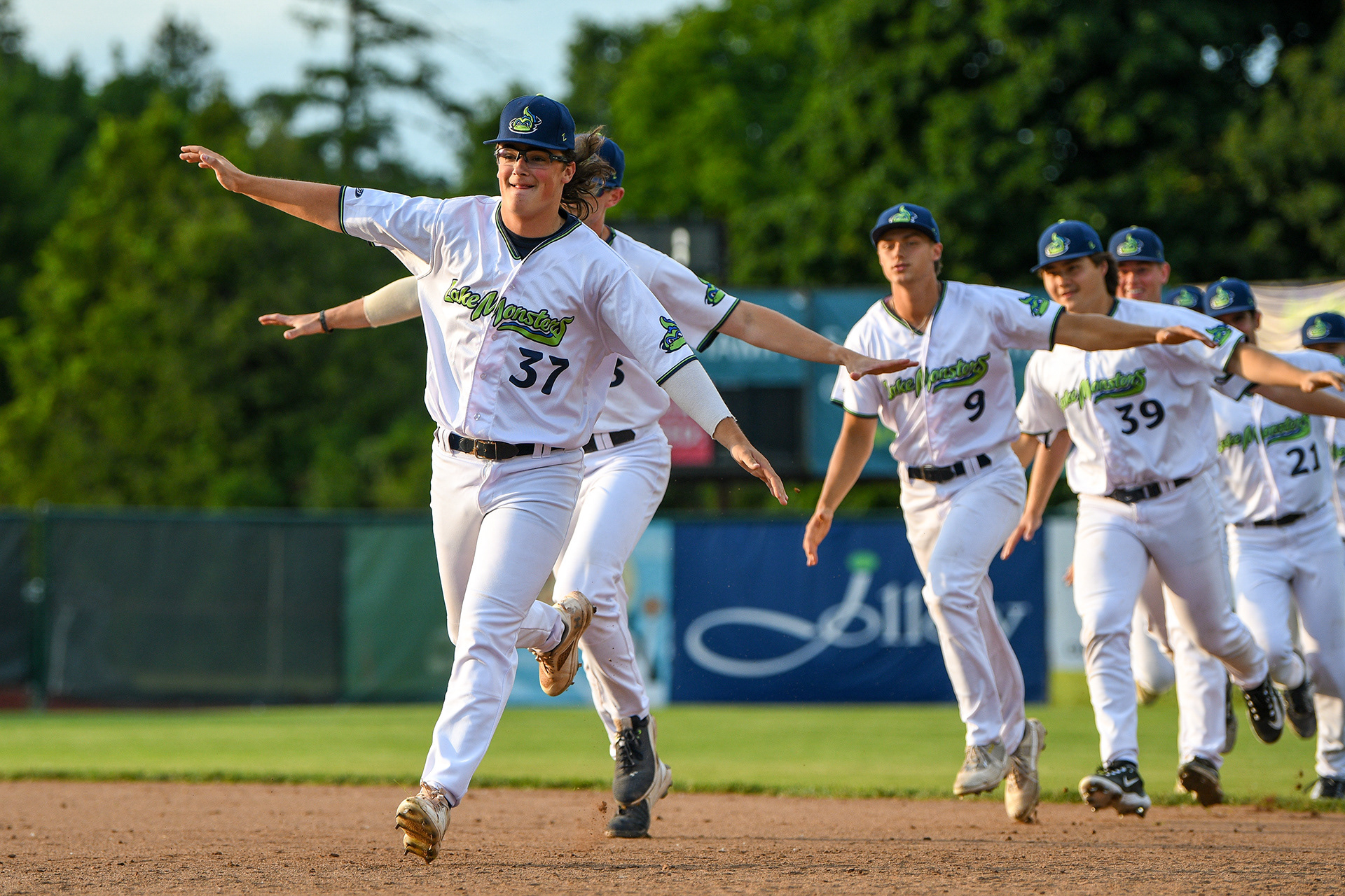 Vermont Lake Monsters 2023 : Airplane zooms after a game win from the bull-pen, led by Oliver (Ollie) Pudvar