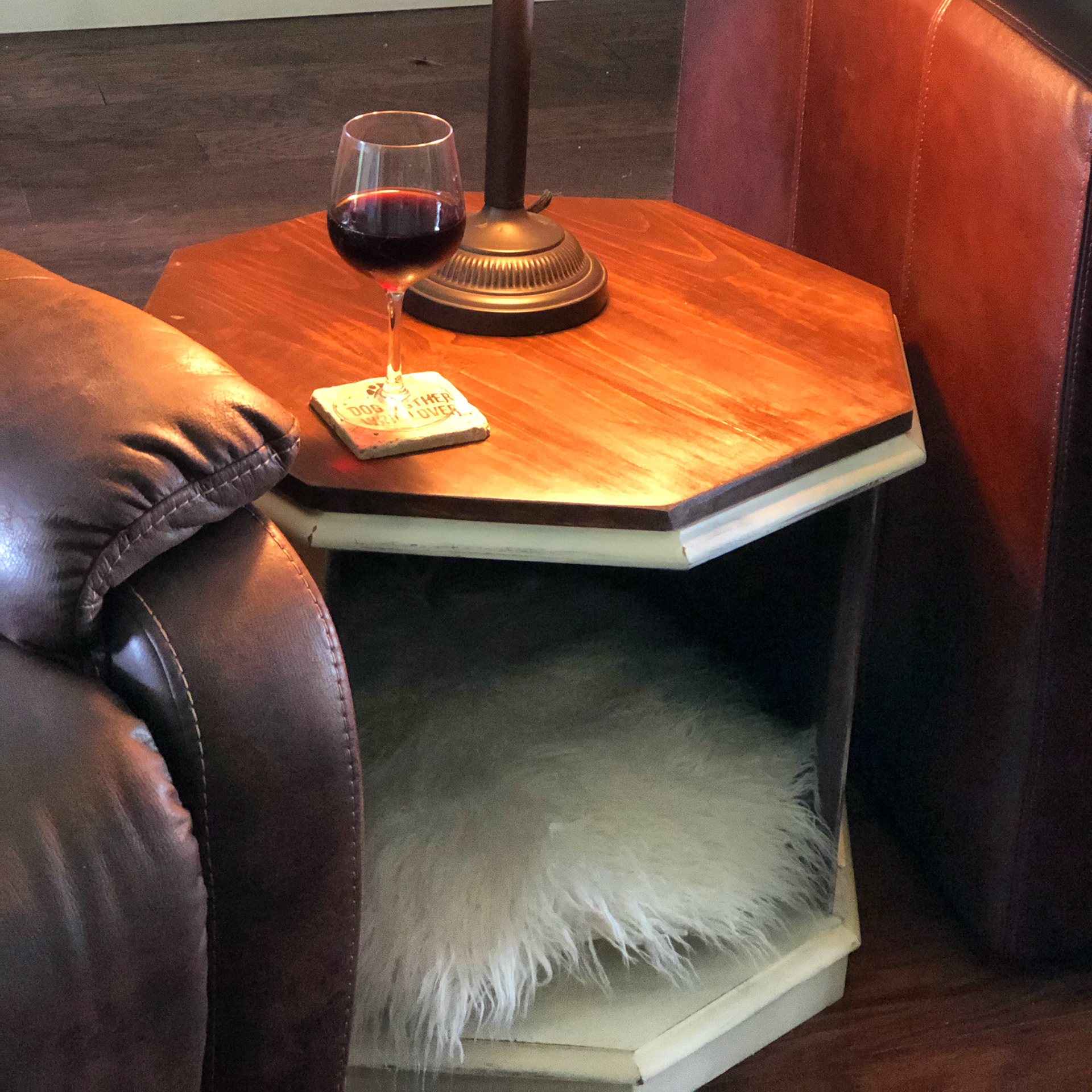 Upcycled dated end table converted to a bed bed