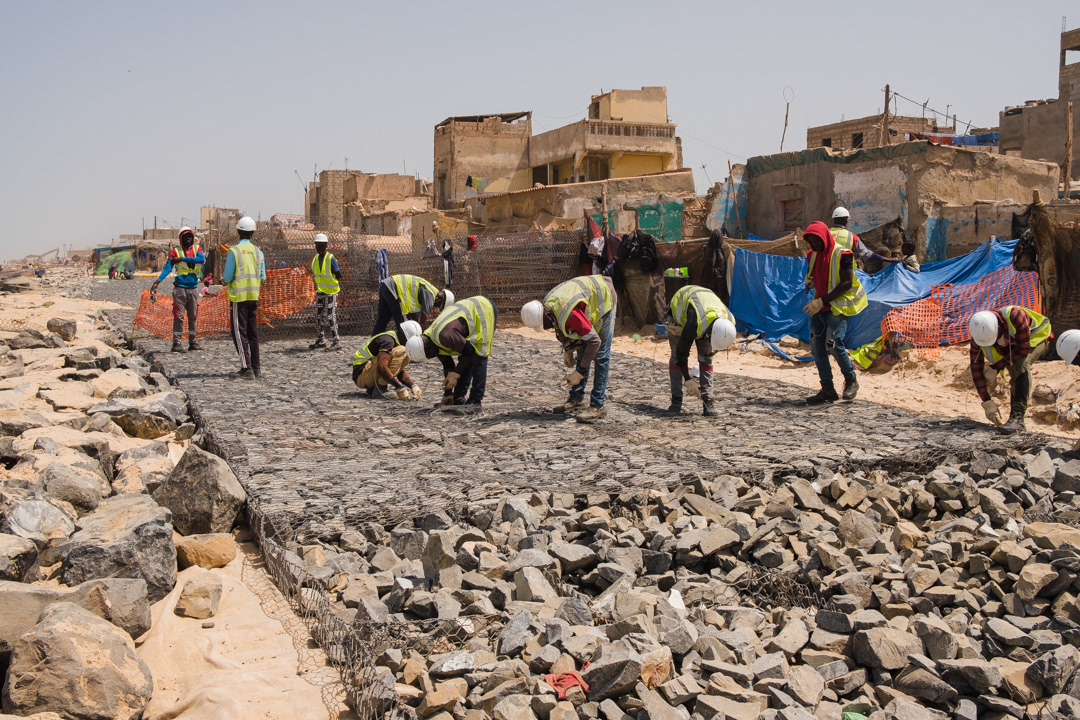 Sea wall building is due to finish by the end of this year, when the barrier will run 3.5 km along the coast