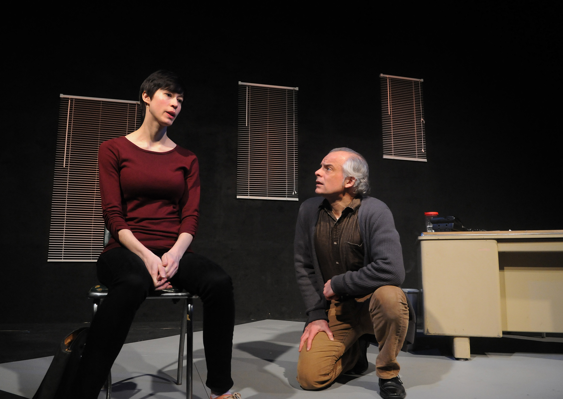 Oleanna by David Mamet, Third Avenue PlayWorks, directed by Bob Boles, Production Design by James Valcq. Pictured: Madeline Bunke (Carol), Alan Kopischke (John)
