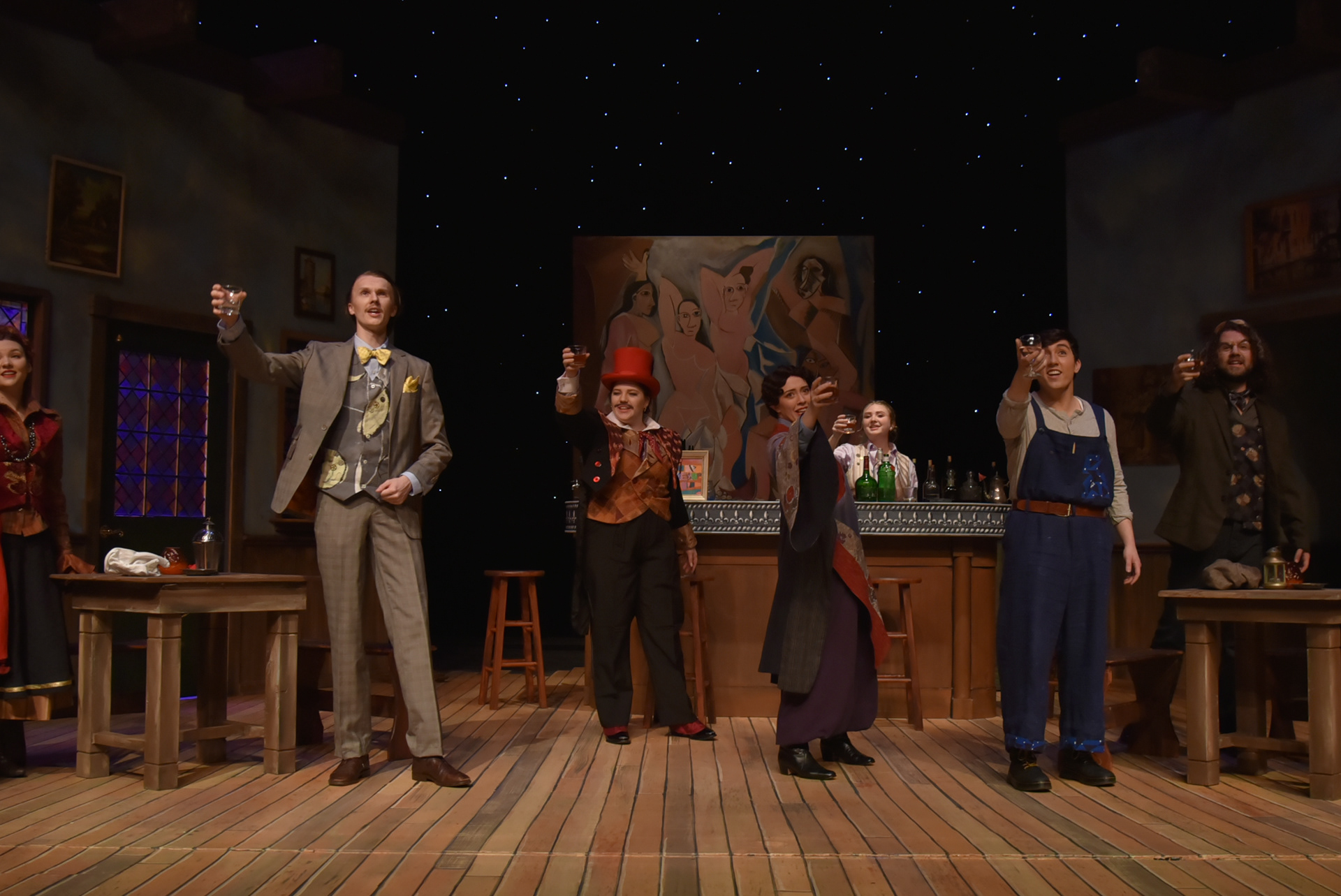 Picasso at the Lapin Agile by Steve Martin, UW-Green Bay, directed by Alan Kopischke, Scenic Design by Alex Polzin, Lighting Design by Dinesh Yadav, Costume Design by Kaoime Malloy. Pictured: Autumn Johnson (Countess), Ty Witthuhn (Einstein), Jenny Witt (Schmendiman), Audrey Soberg (Sagot), Alexandra Smith (Germaine), Mickey Wirtz (Picasso), Mason Amidon (Gaston). 