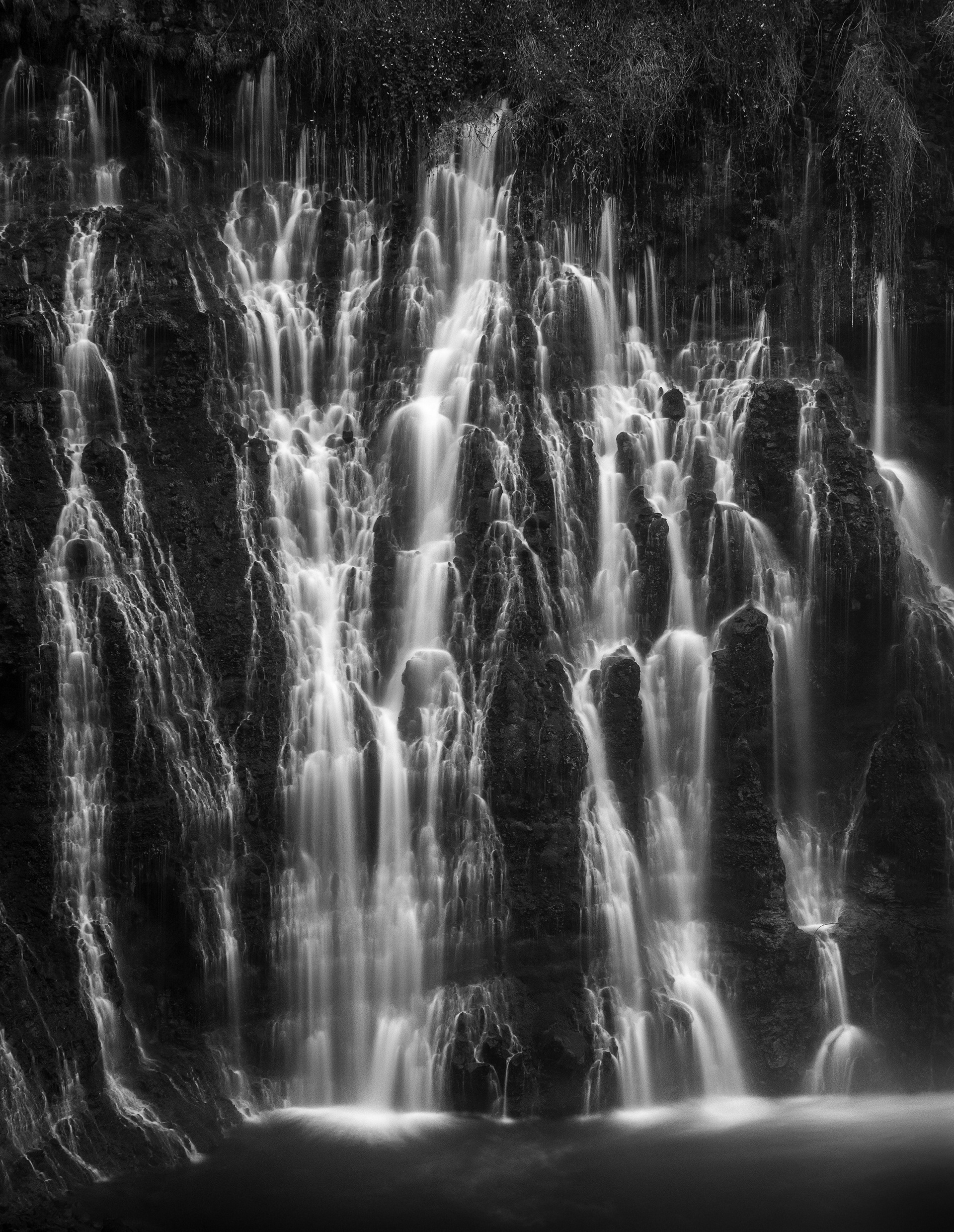 Ribbons of Water Draped on a Cliffside