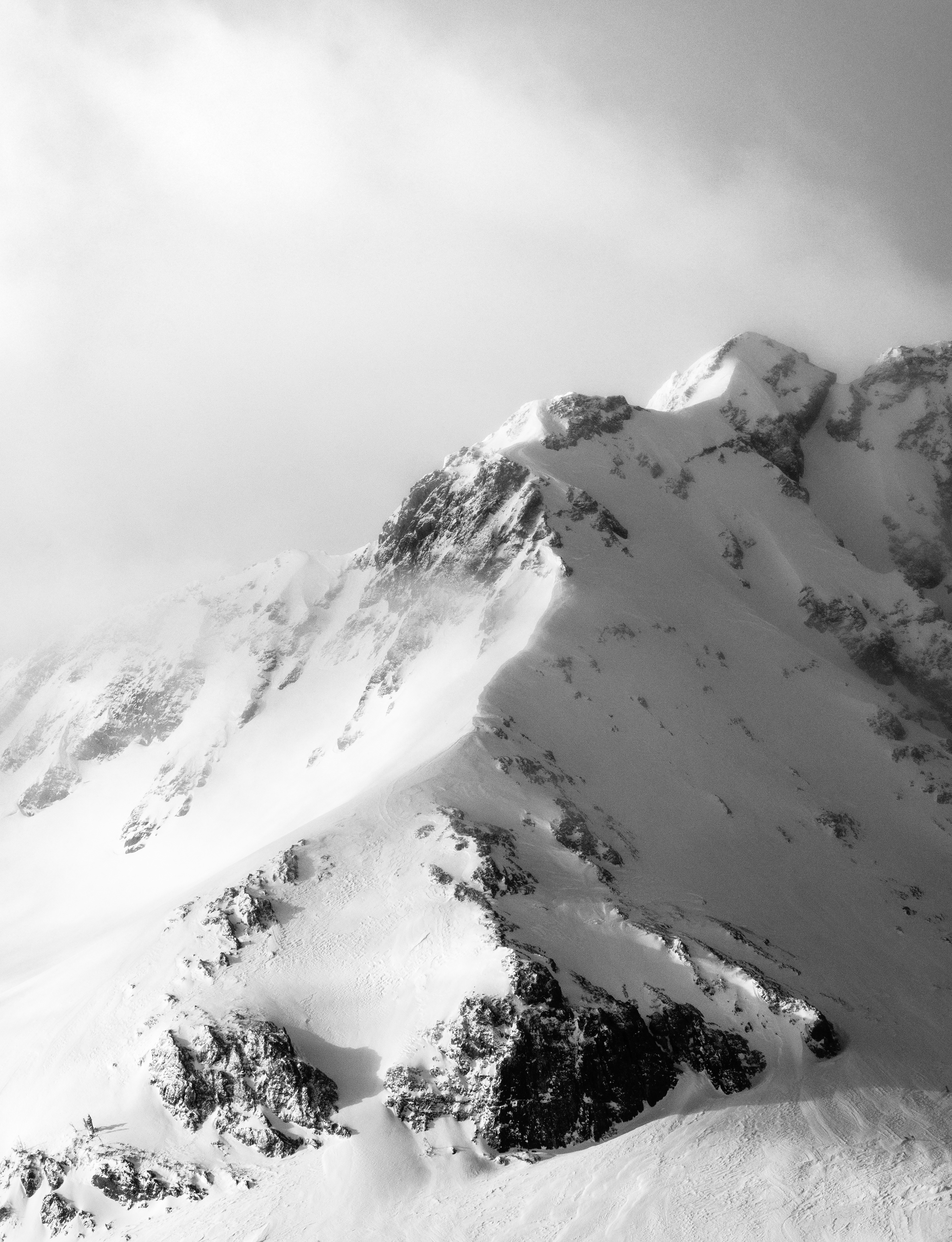 A Snow Covered Ridge of Round Top Peak