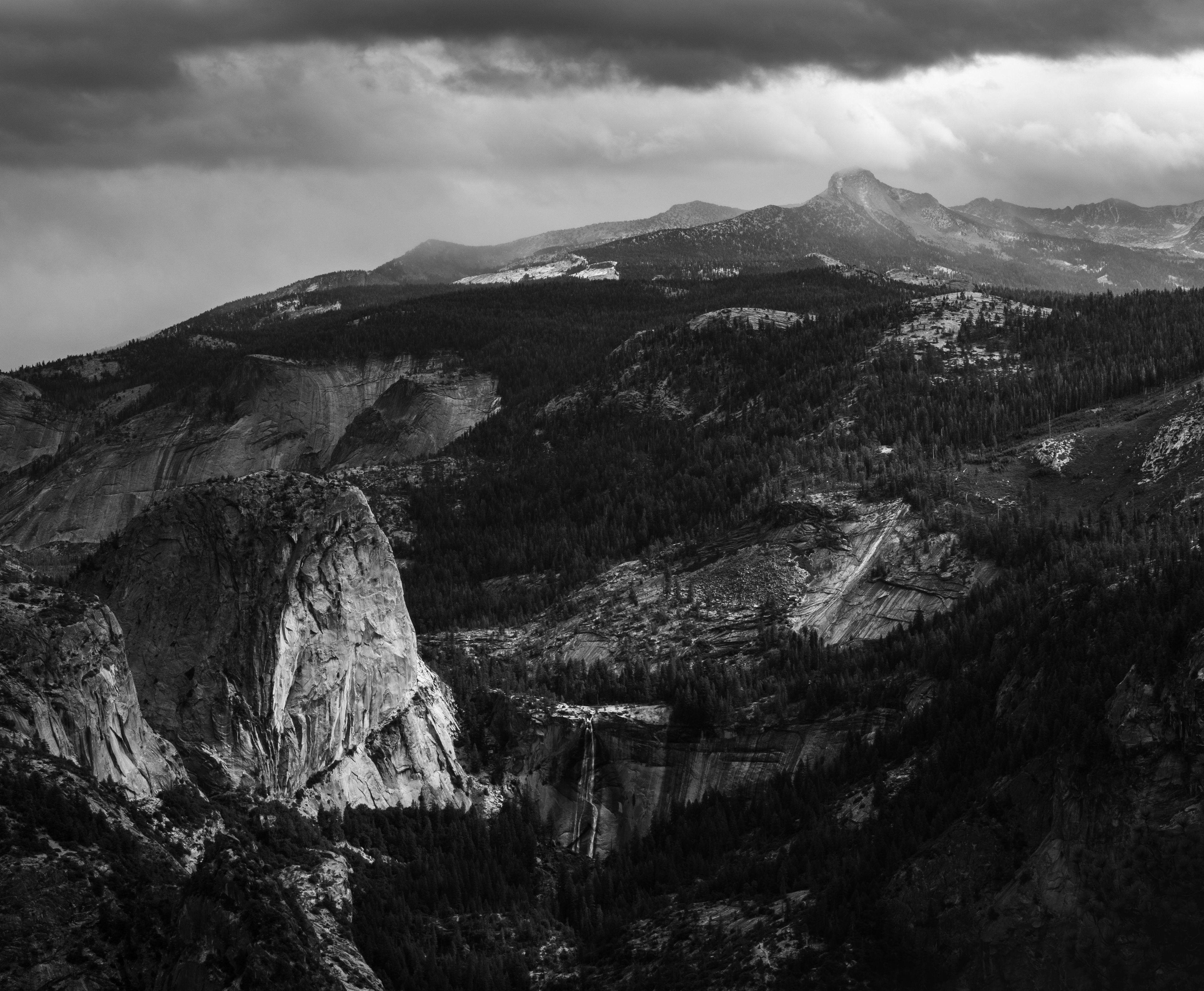 Liberty Cap and Mount Clark Beneath Rain Clouds