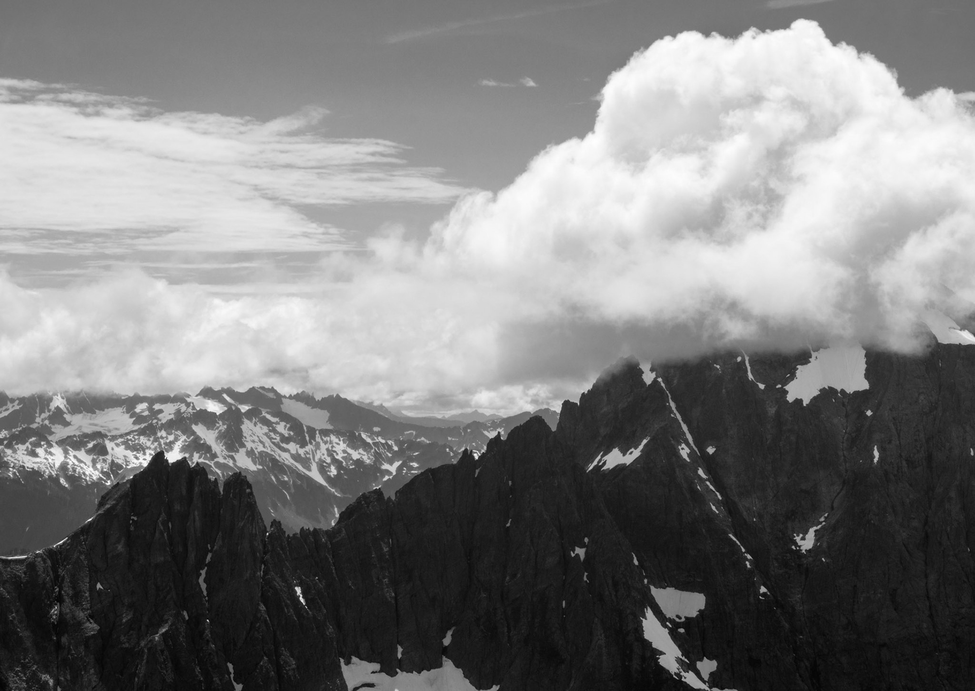 Soft Clouds Atop the Peaks