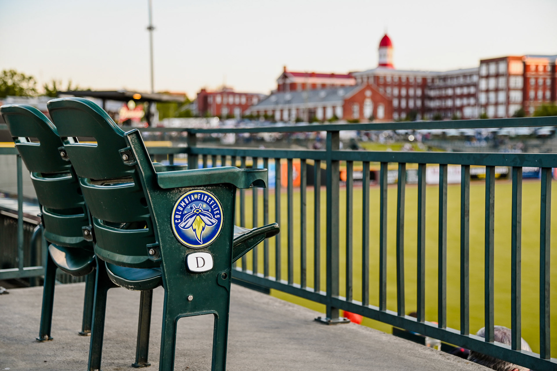 Closeup of a seat in the stadium with the Babcock building in the background
