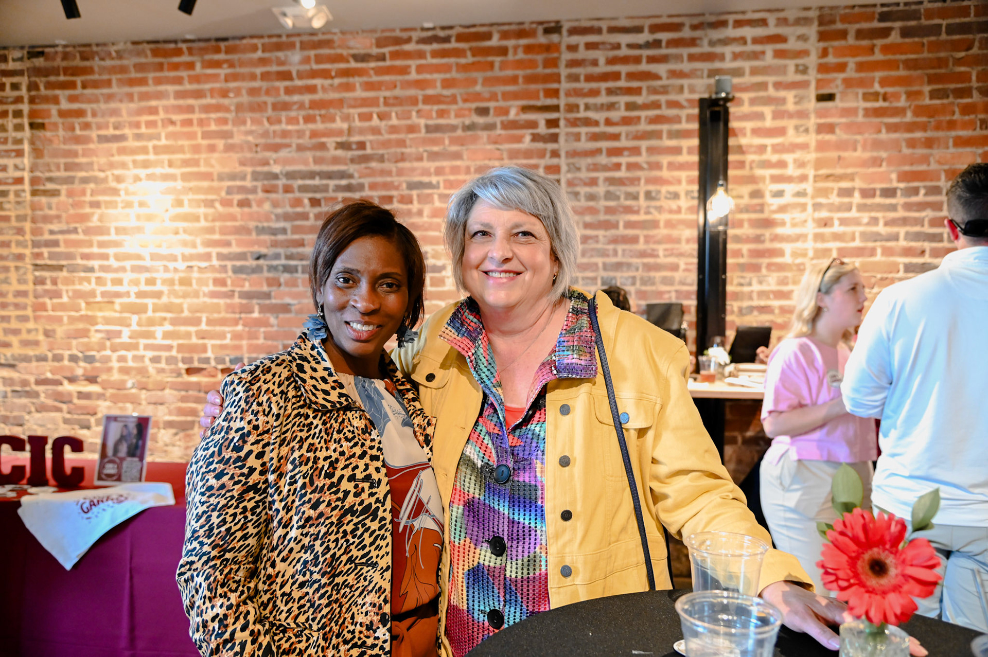 Rebecca Jordan posing with an alum