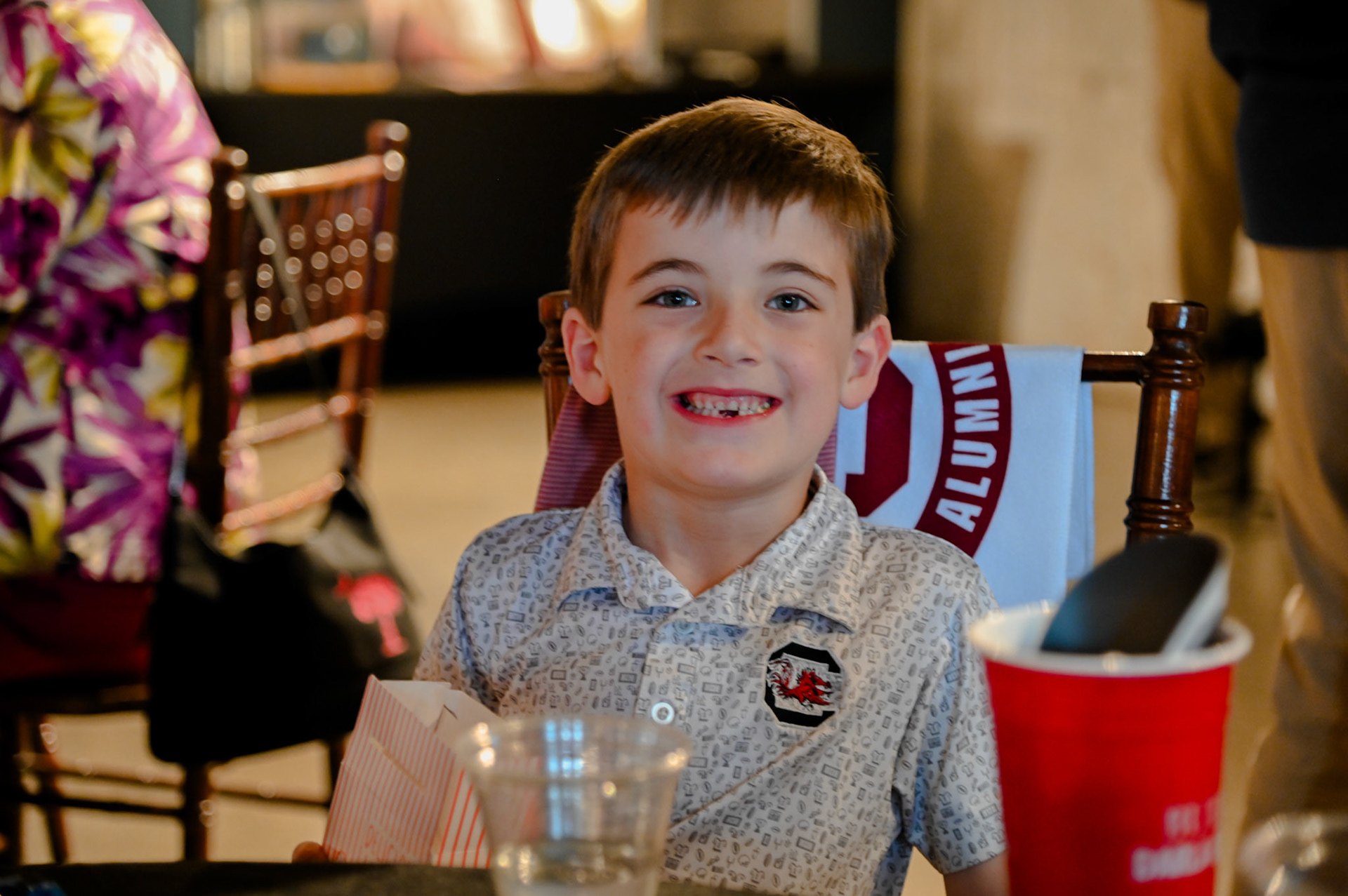 A child smiling at the camera