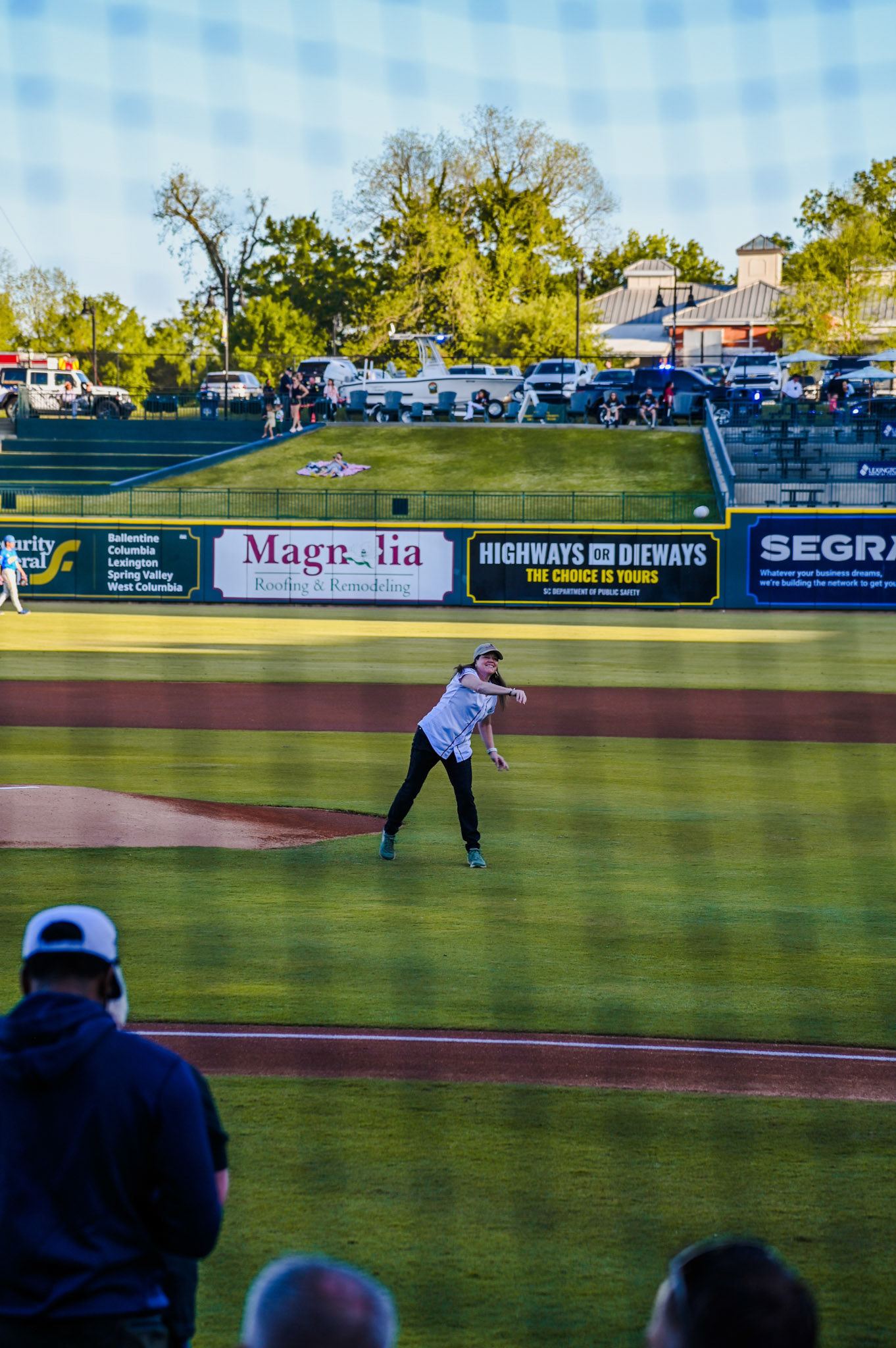 Dean Sabo-Attwood throwing the first pitch at the baseball game