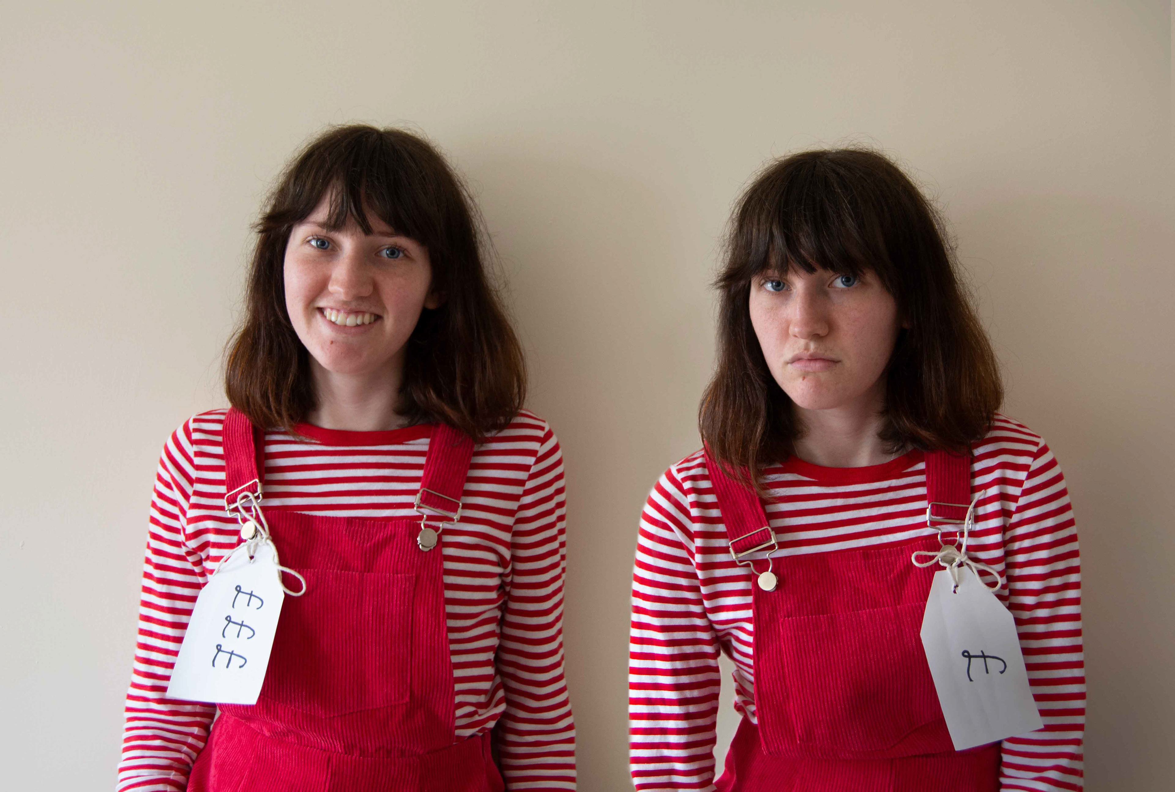 Two woman have two different price tags. One high, one low.