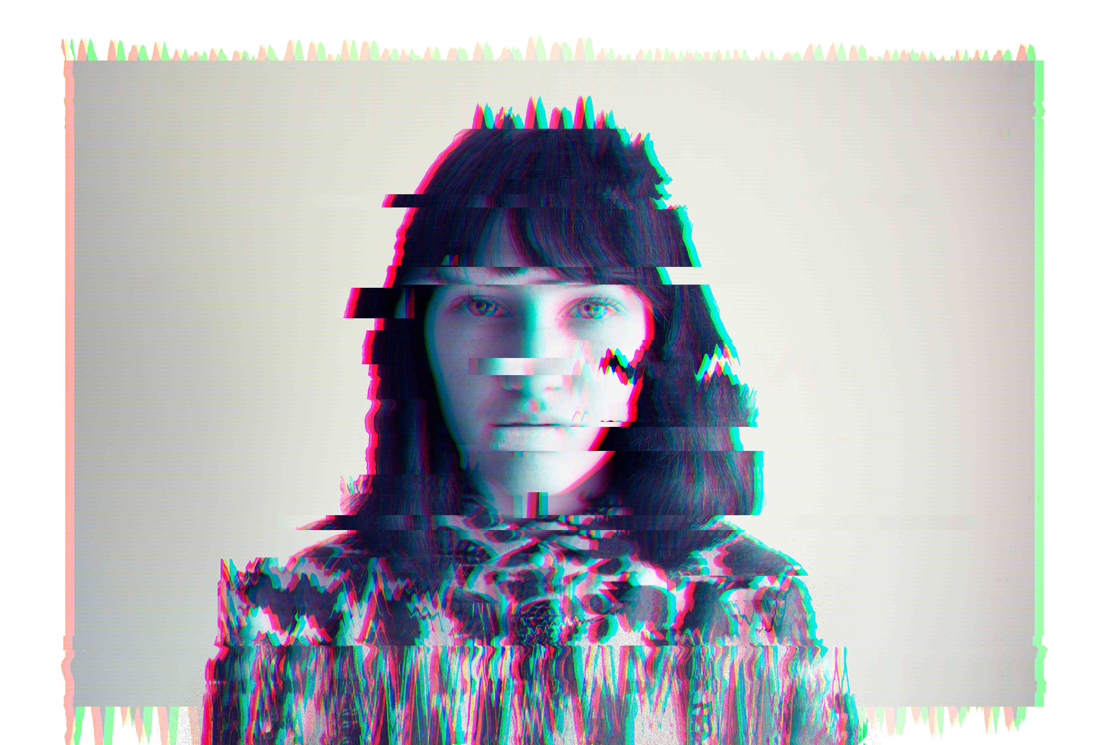 A woman with glitchy lines and distortions across her face and body.