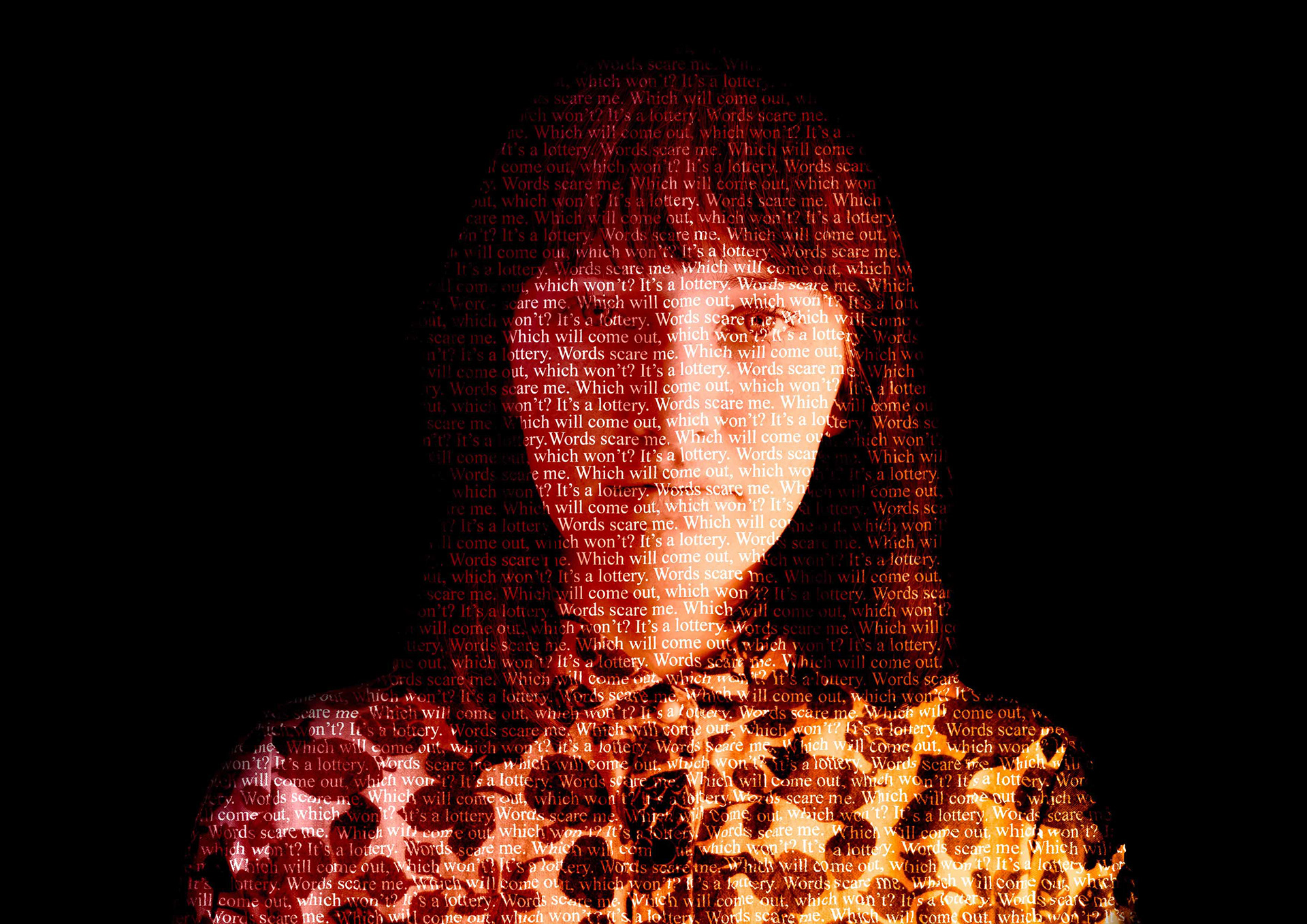 Woman with words written across her face and body.