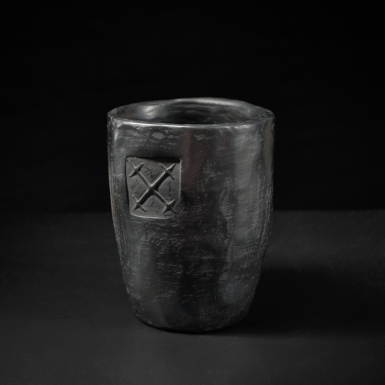 Artisan mug, home studio with one light and a reflector.