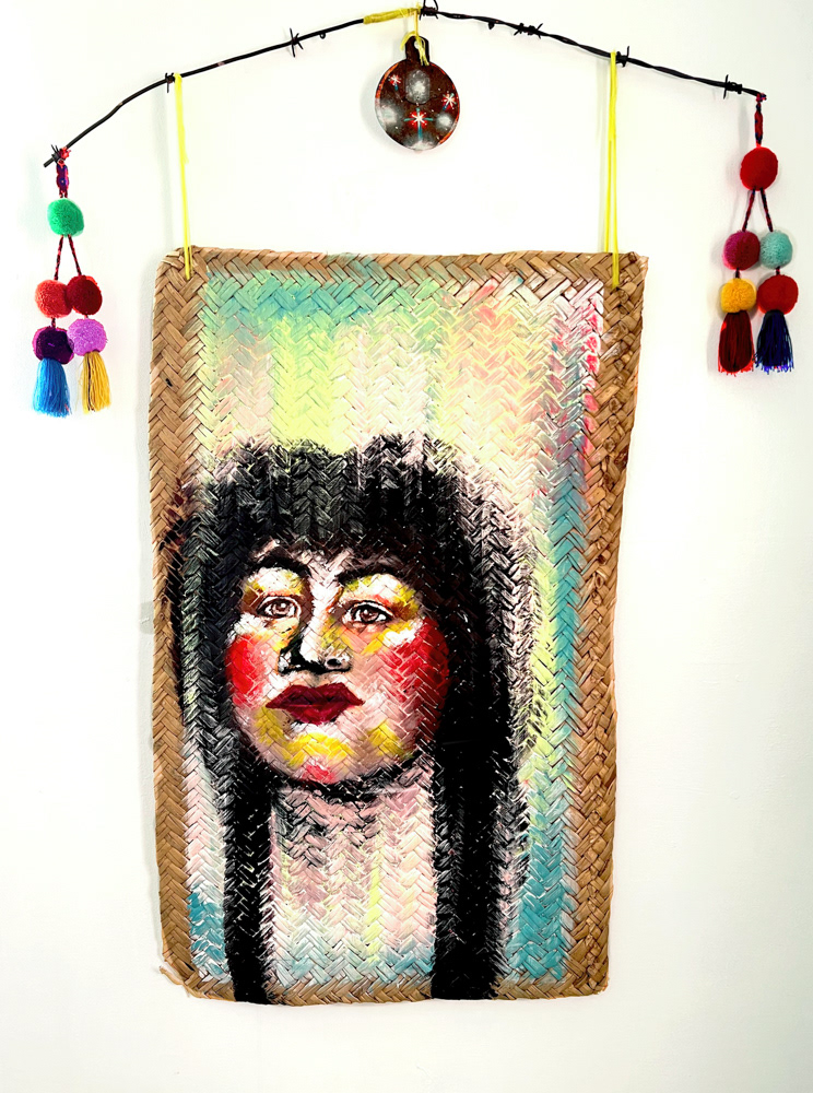 Abuelita Leonor, 2021. Petate mat, found Objects, acrylic. 46 x 32 x 1 inches.