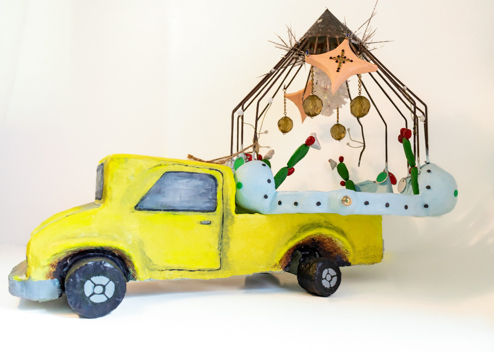 Vamos a la Fiesta, 2022. Found objects, mixed media. 22 x22 x 31 inches