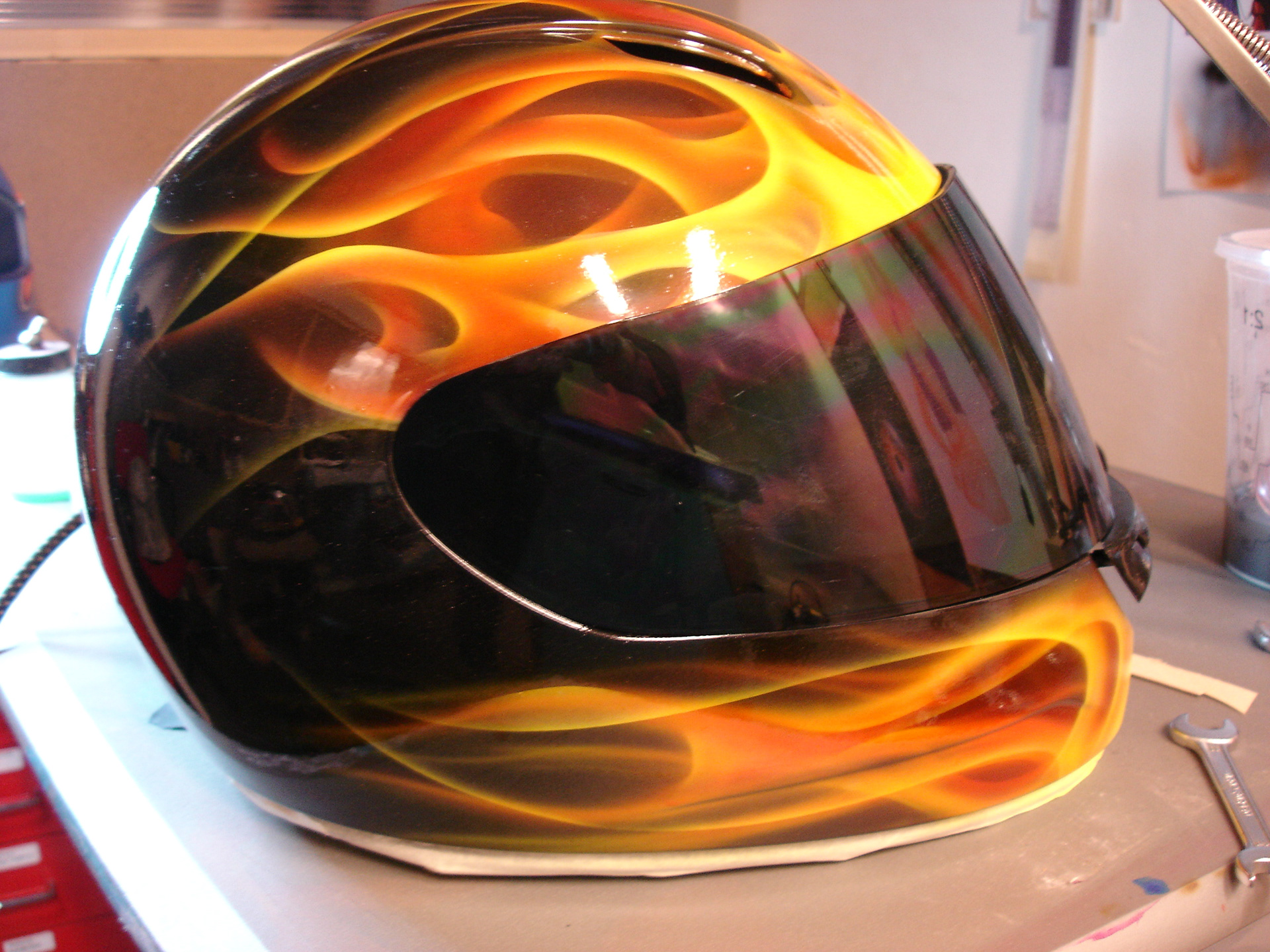 Realistic flame airbrush design on helmet