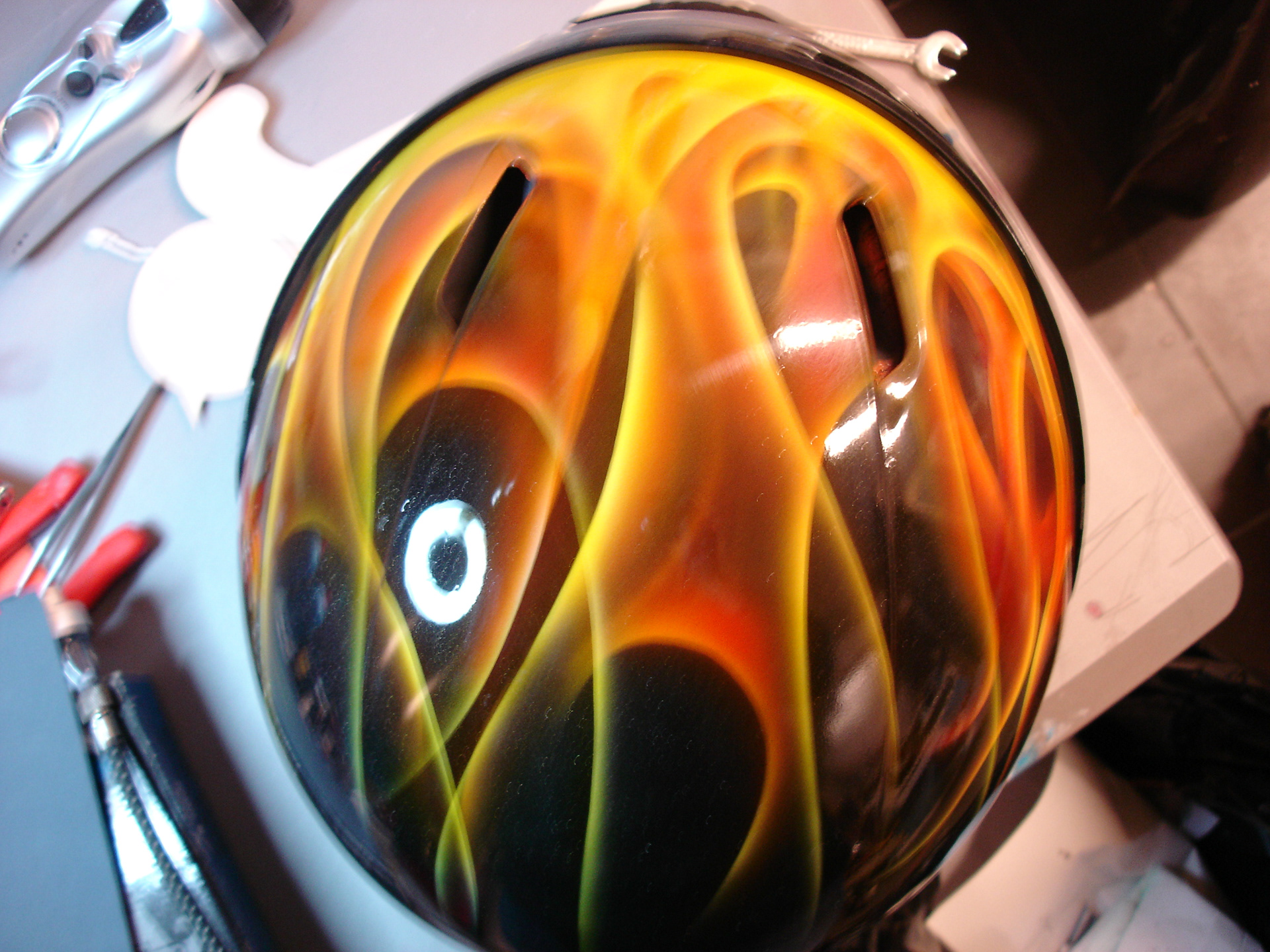 Realistic flame airbrush design on helmet