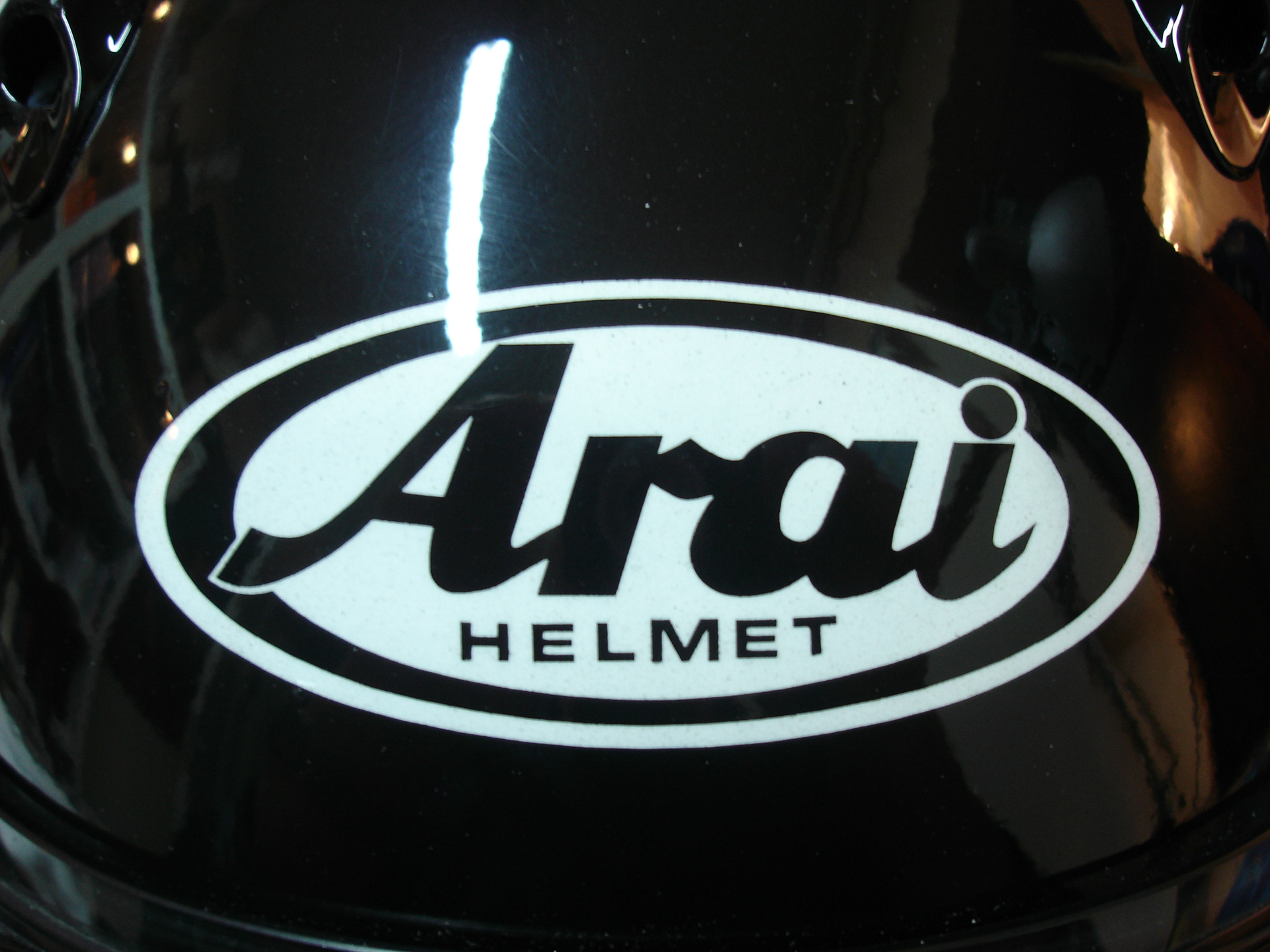 Arai helmet with a custom airbrushed Honda Hornet design 