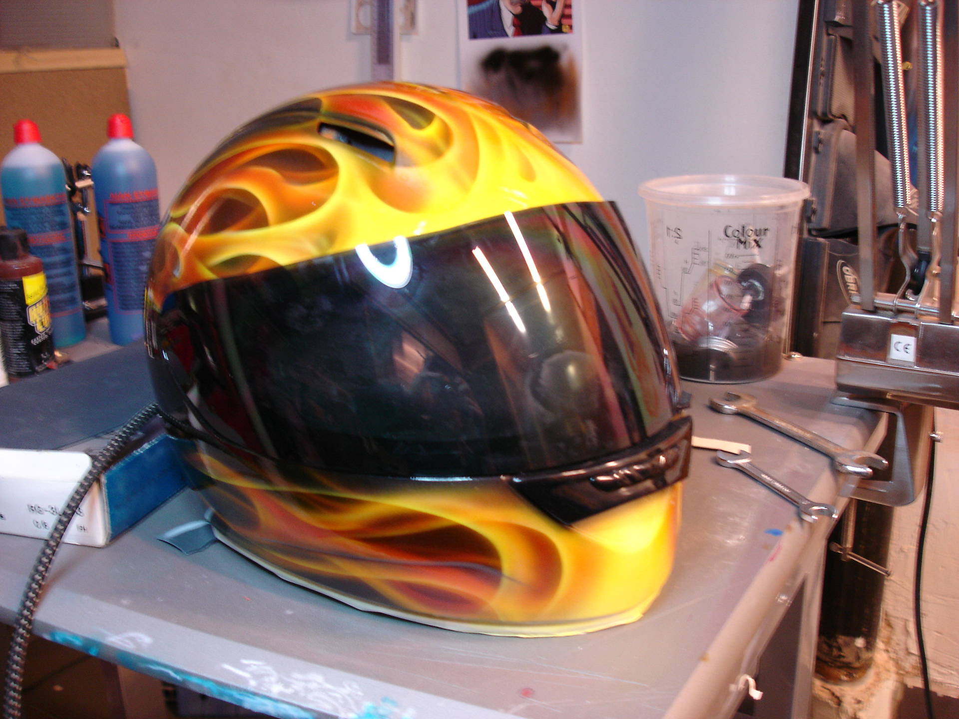 Realistic flame airbrush design on helmet