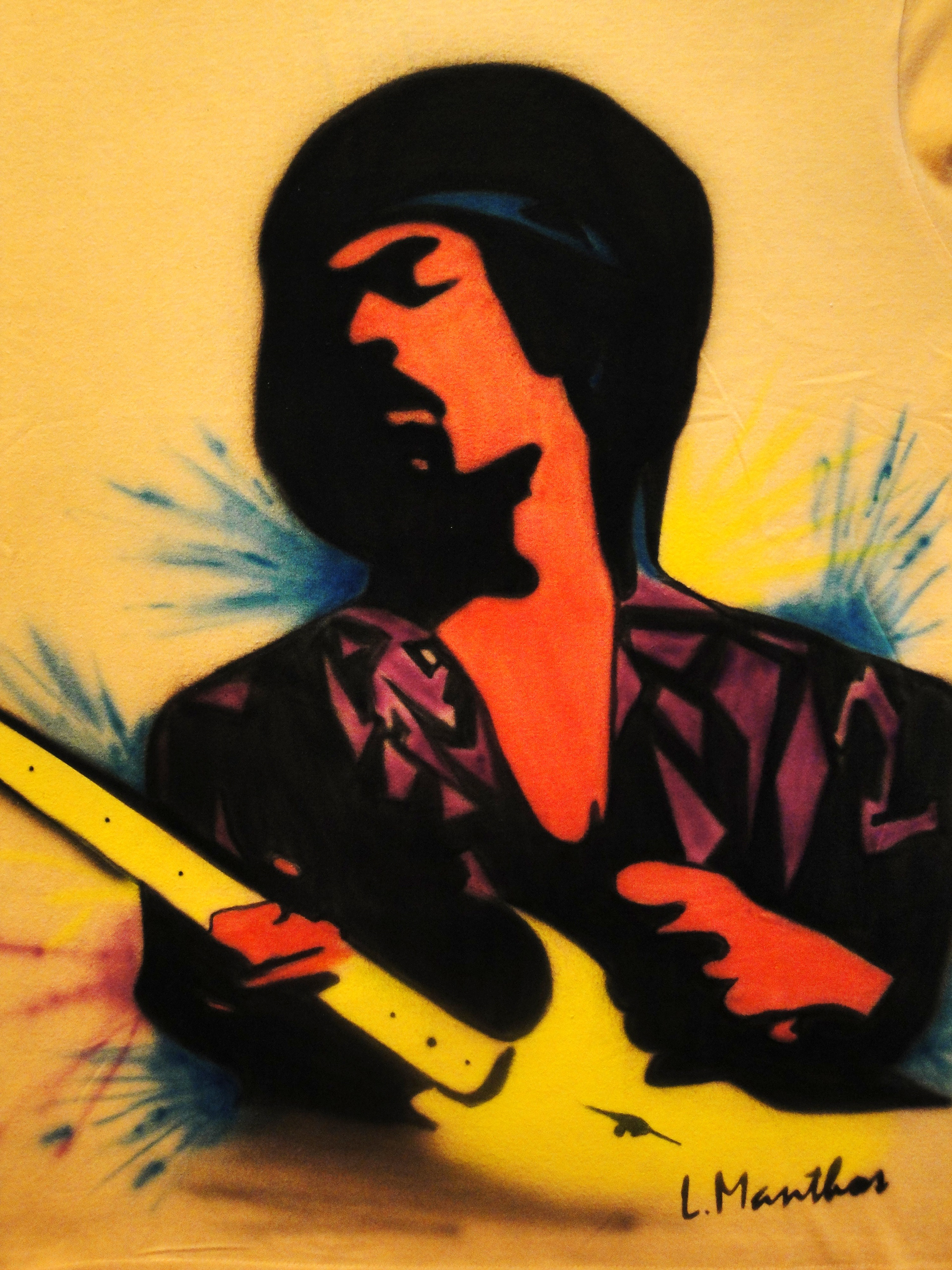 Jimi Hendrix (airbrush on yellow t-shirt)