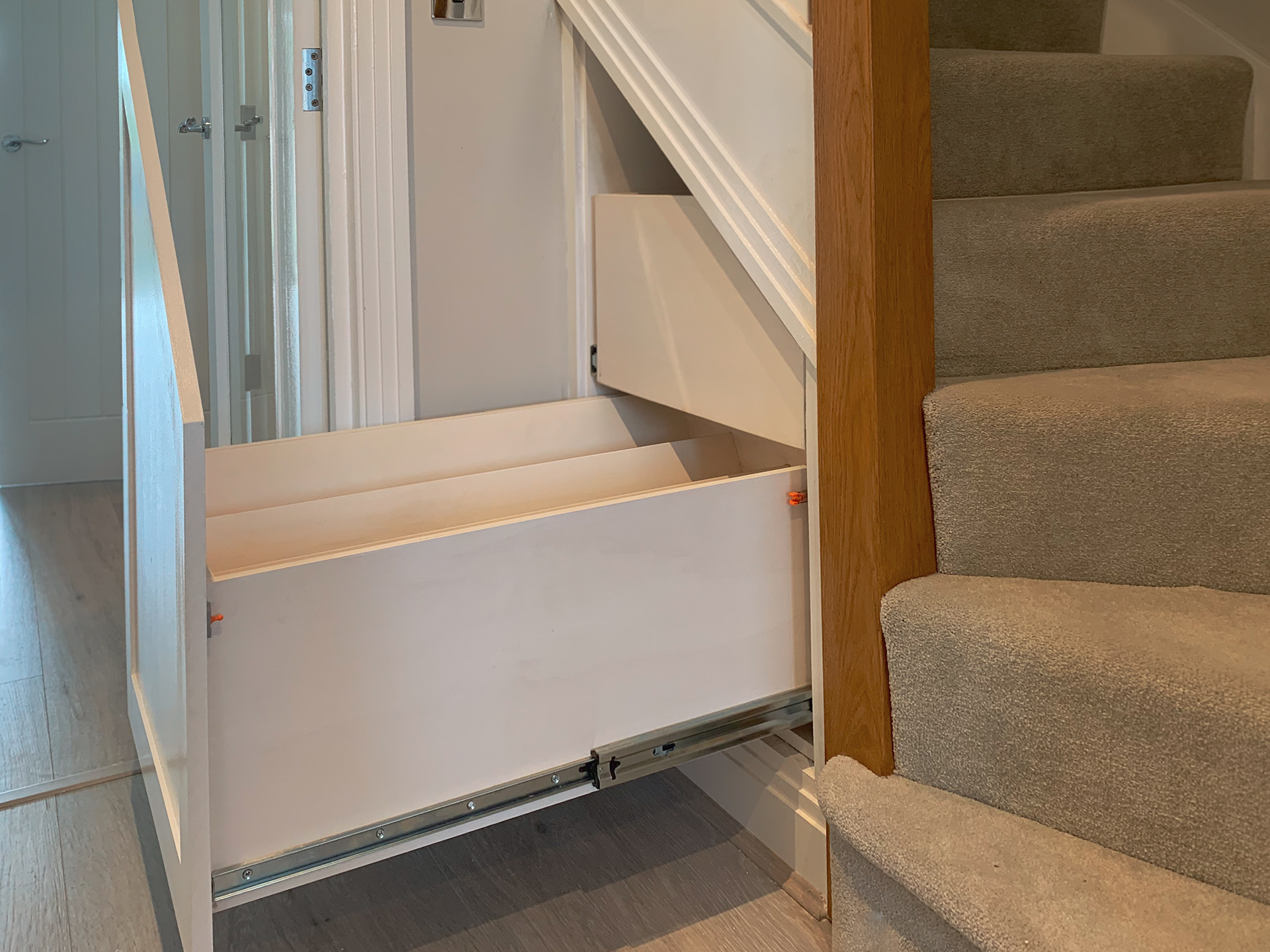 Bottom pull out drawer