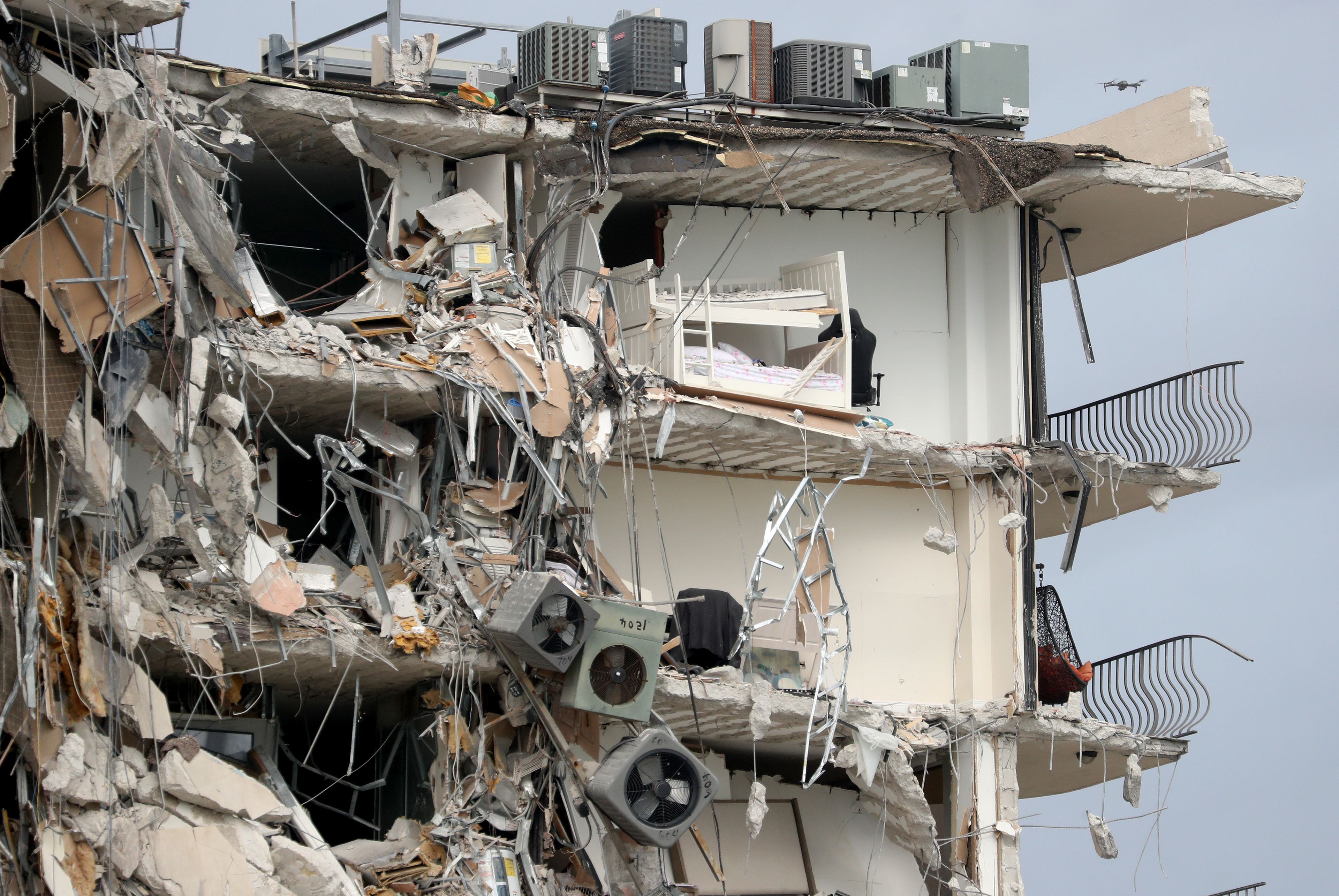What appears to be a bunk bed can be seen from part of the 12-story oceanfront Champlain Towers South Condo that partially collapsed during the early morning of June 24, 2021 in Surfside, Fl.