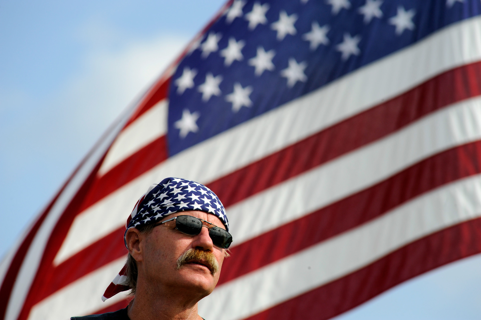 Charles Heier, a member of the Vietnam Veterans Motorcycle Club, listens to speakers during a Memorial Day ceremony in Fort Lauderdale, Fl in 2008.