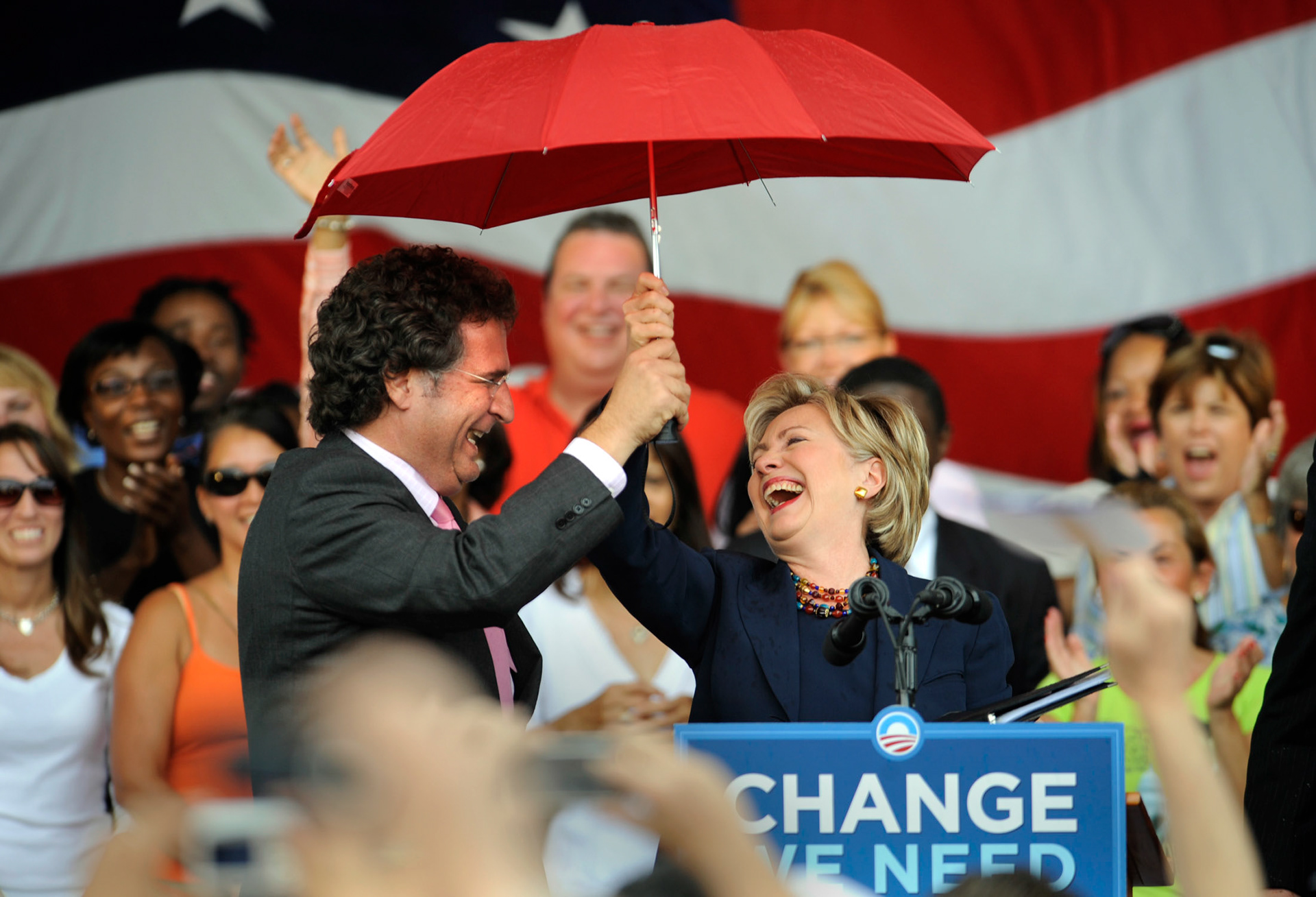 Democrat Joe Garcia keeps then Sen. Hillary Clinton dry during a downpour in Fort Lauderdale as she campaigned for Barack Obama in October of 2008. 