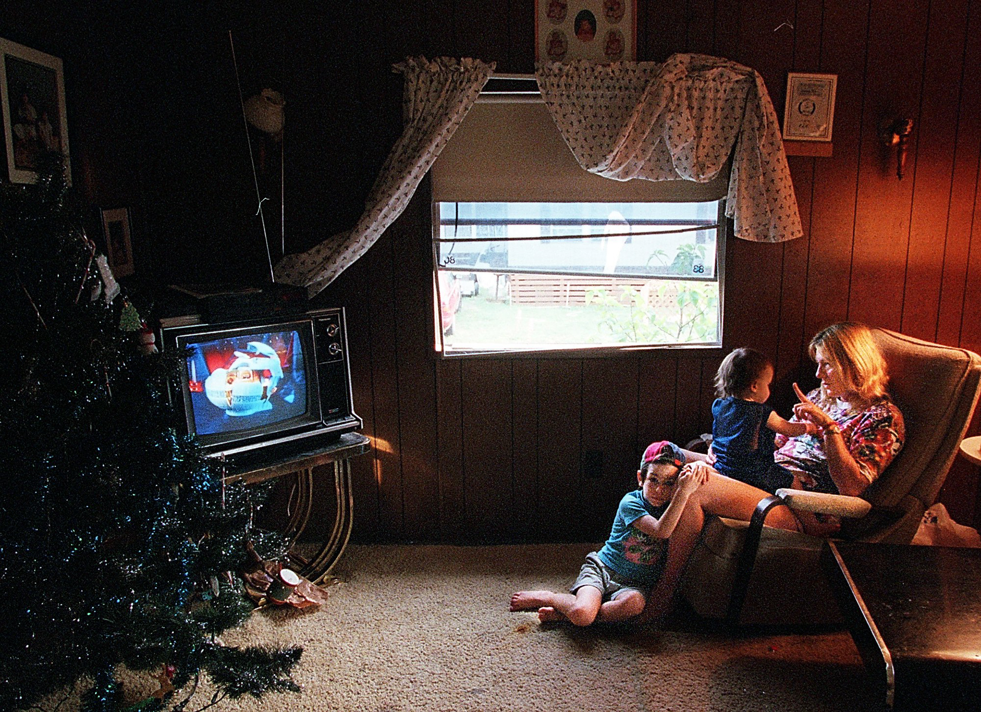 .Yvonne Rice  with her sons, D.J. , 16 months, and Steven, 4,  inside their trailer home in Coconut Creek, Fl.  The family was the subject of the Sun-Sentinel's Season to Share series in 1997.