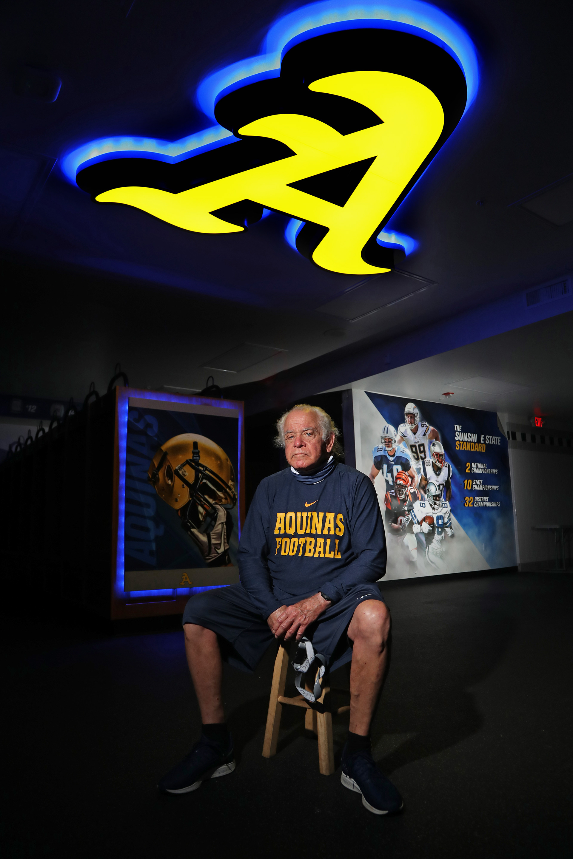 St. Thomas Aquinas Athletic Director George Smith inside the high school's football locker room in March 2021 in Fort Lauderdale, Fl.  The former football coach is retiring after 49 years at the school.