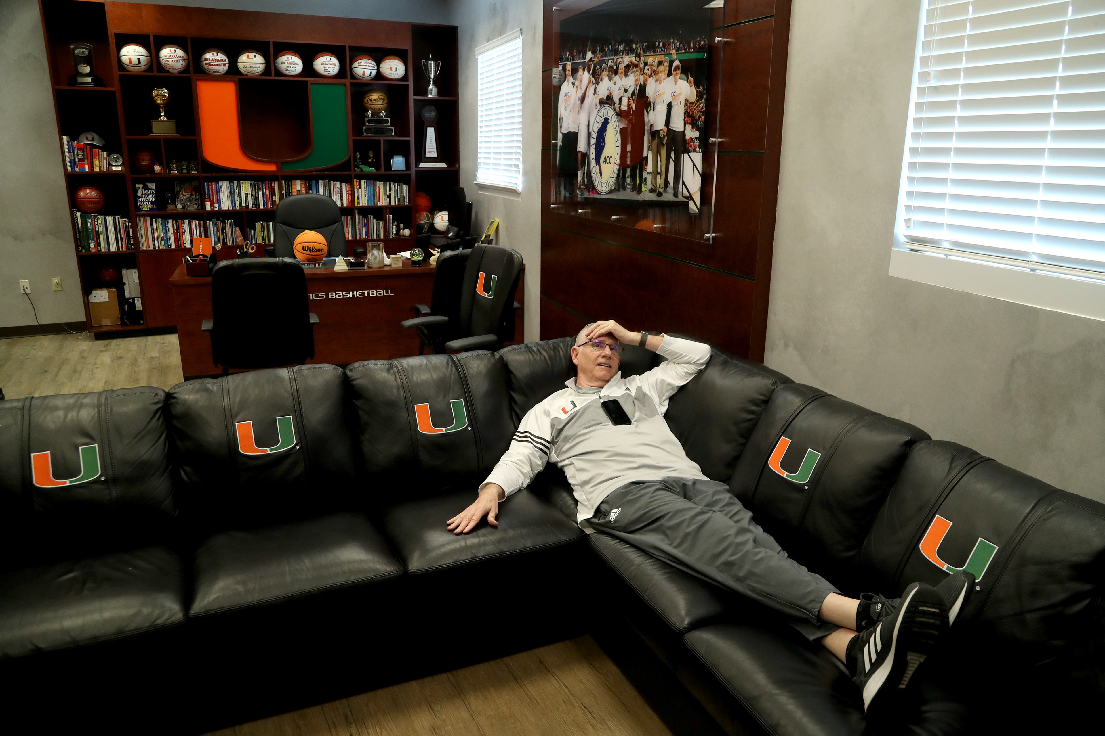 University of Miami head basketball Coach Jim Larranaga watches film of competing team Iowa State in March 2021 as he prepares to take his team to the NCAA Sweet 16 tournament in Chicago.