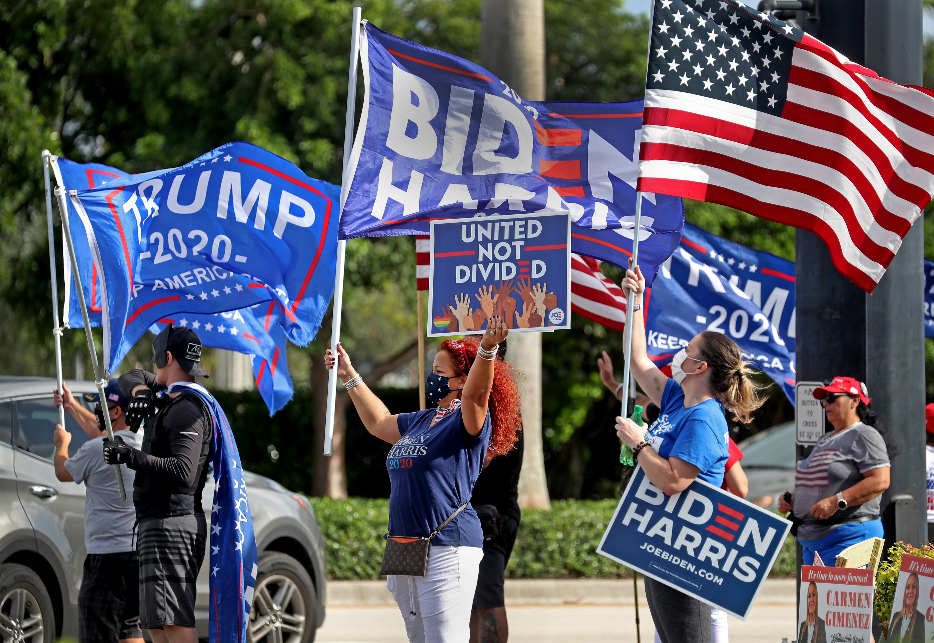 Trump and Biden supporters campaign in Hallandale Beach, Fl. on Election Day 2020.