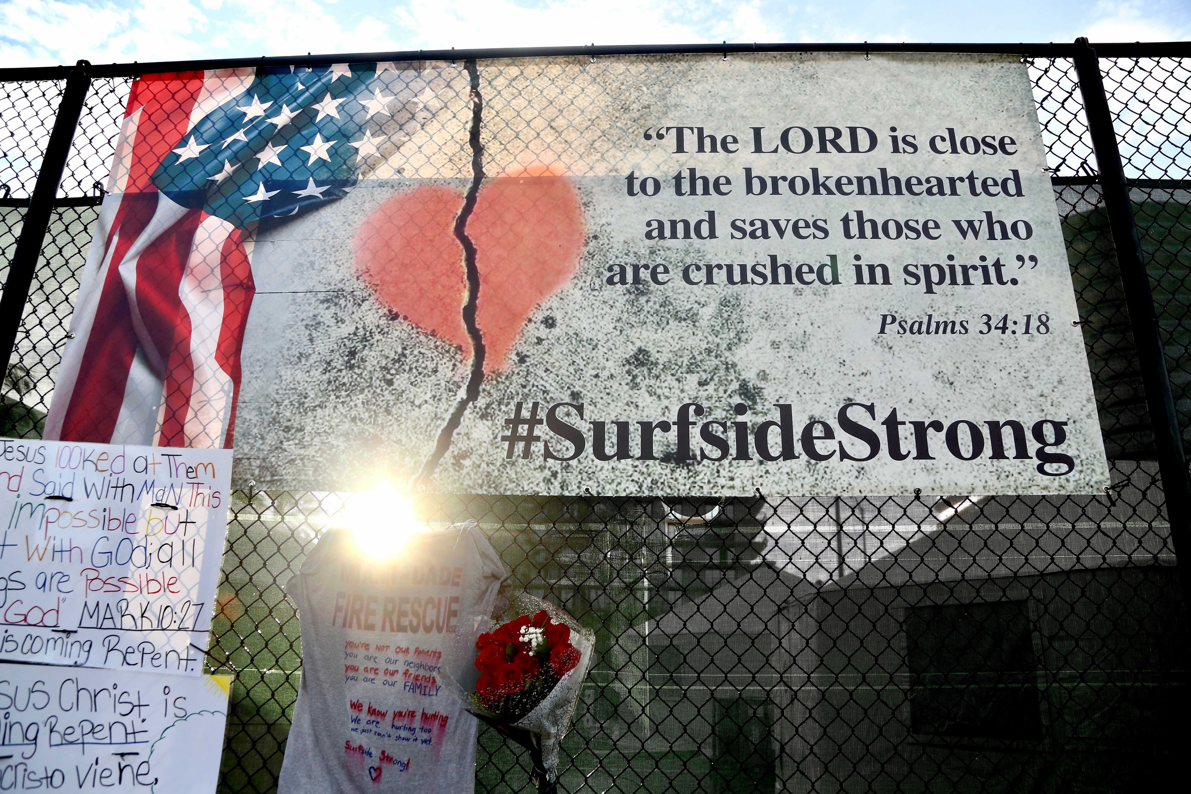 A memorial is erected near the site of the Champlain Towers South, a 12-story beachfront condominium in Surfside, Fl. that partially collapsed during the early hours of June 24, 2021 causing the deaths of 98 people.