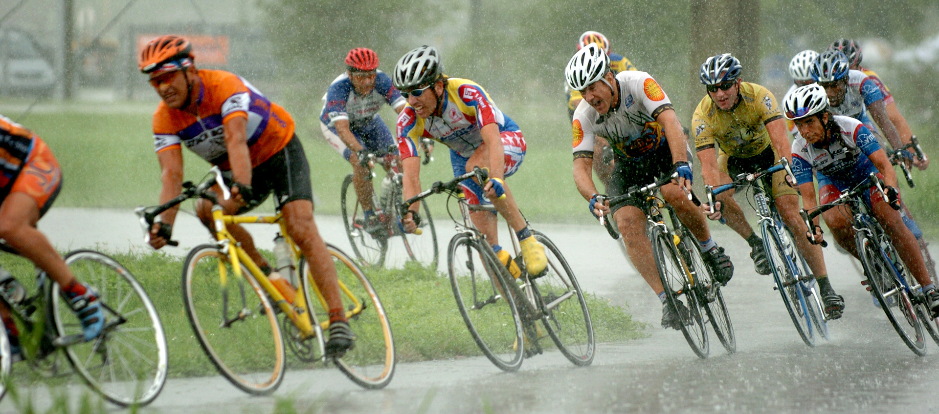 Cyclists compete in a short-course race during a downpour in Cooper City, Fl. in 2004. 
