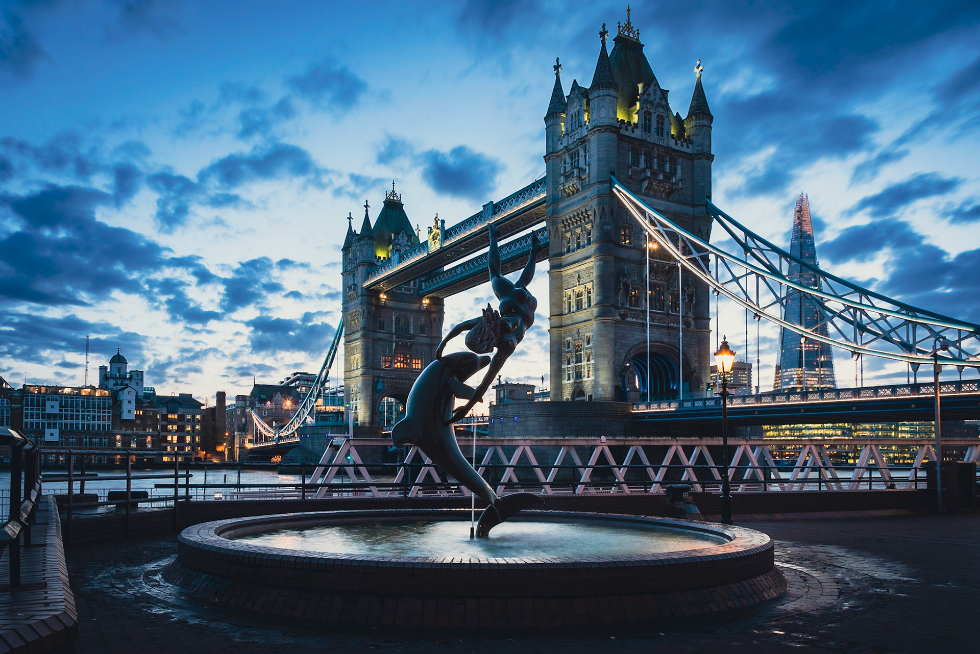 ‘Girl with a Dolphin’ framed by Tower Bridge