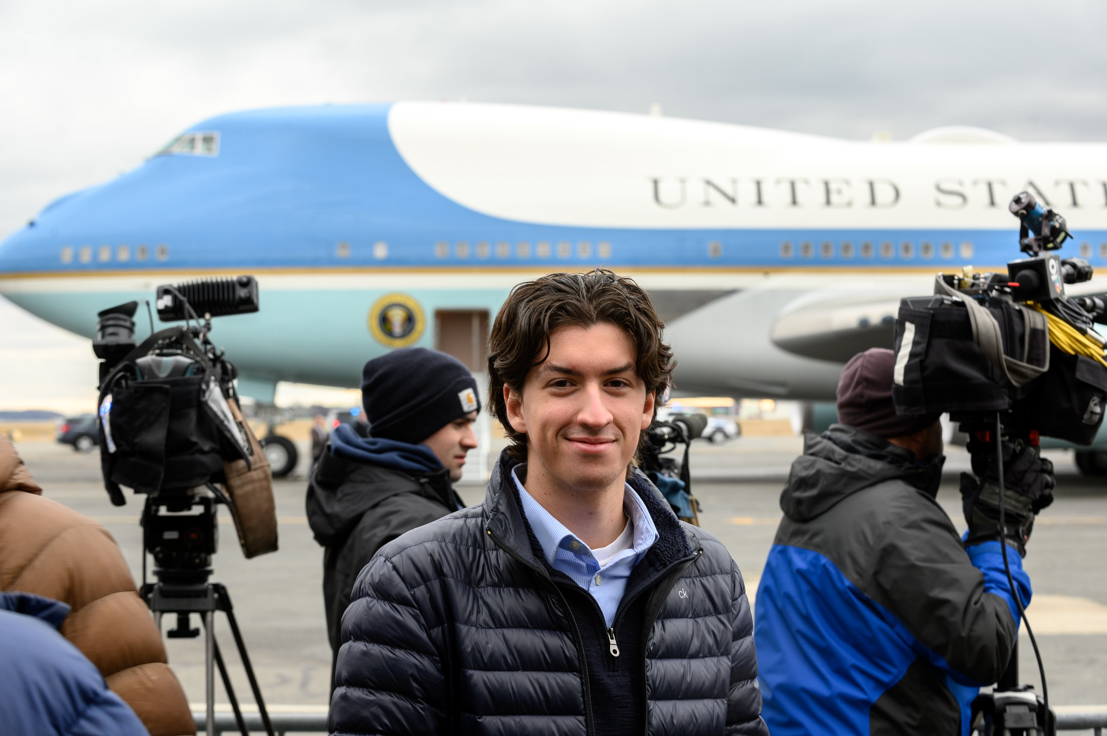 Matthew in front of Air Force One awaiting President Biden's arrival to Boston. Photo by Andrew Burke-Stevenson