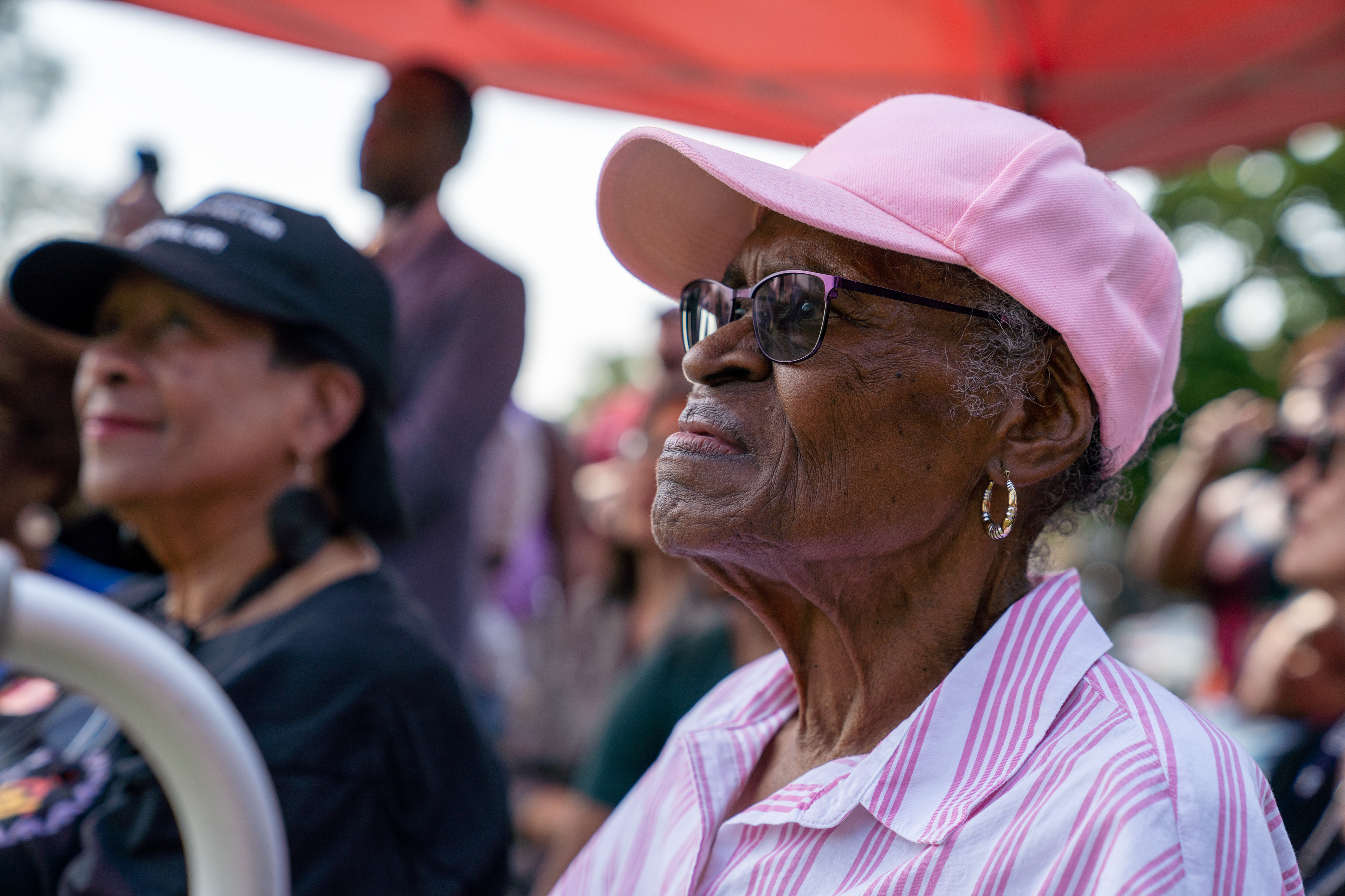 86-year-old Delores Holmes watches as community members break ground on a new school in Evanston, Ill. Holmes had been alderperson of the 5th Ward and a community activist who fought for a new school in the Ward for decades. 