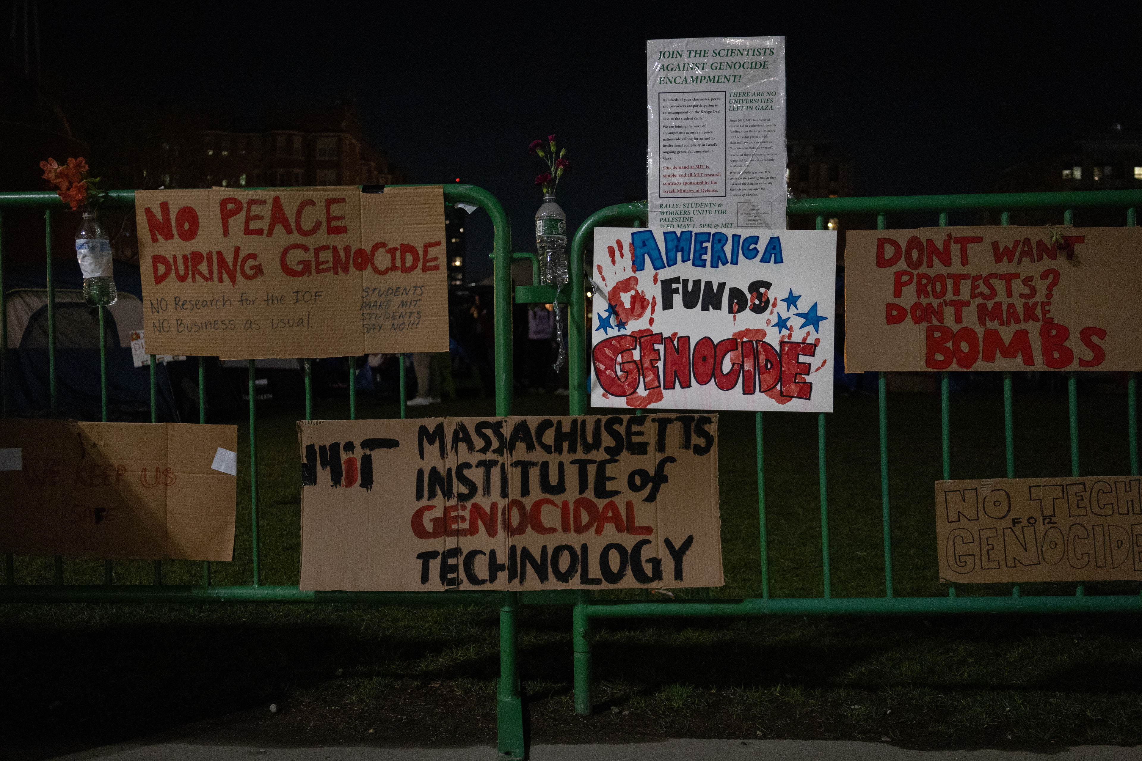 Cambridge, Mass. — Signs on display at M.I.T's encampment protesting the university's involvement with the Israeli government.