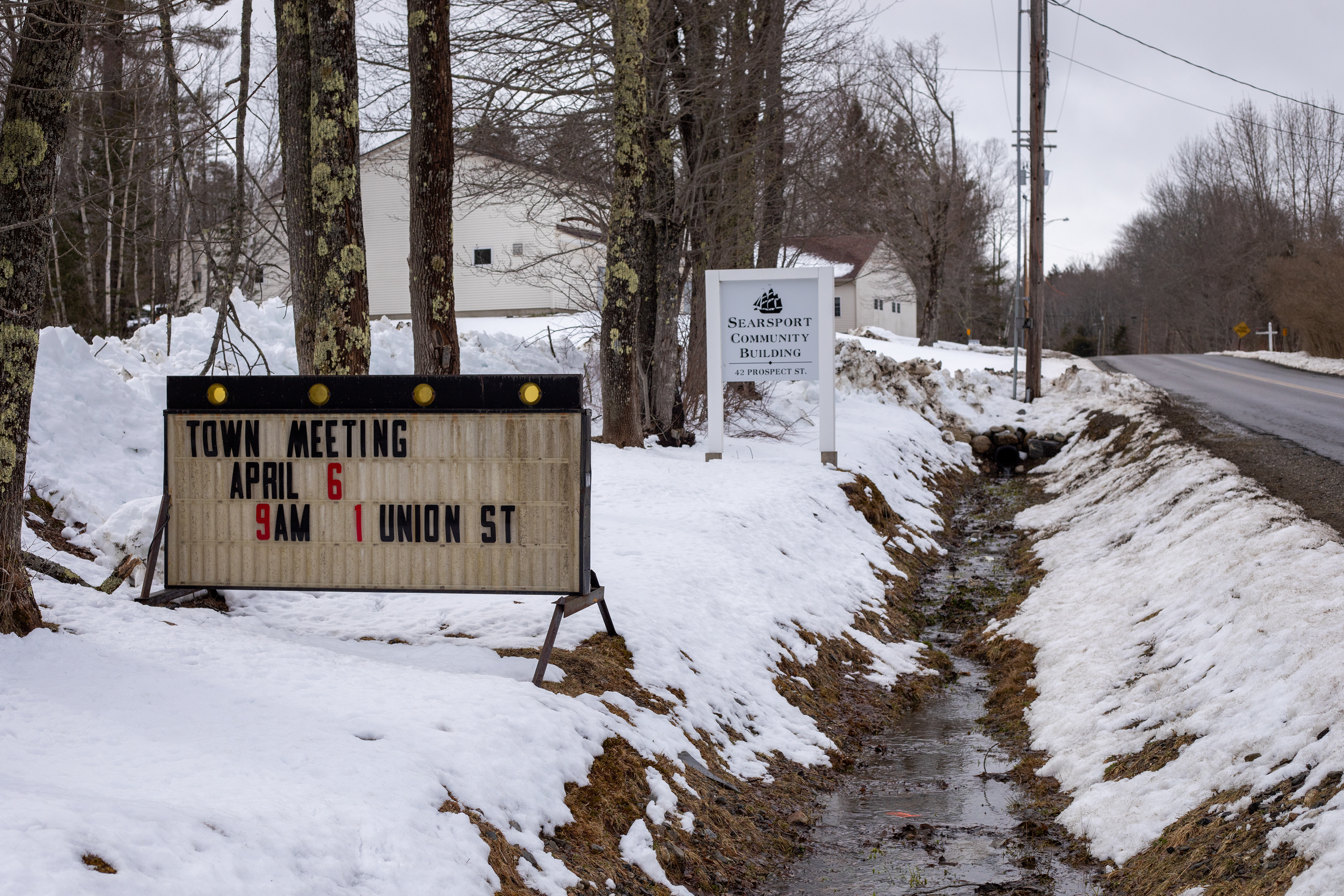 A sign for a town meeting in Searsport in early April.