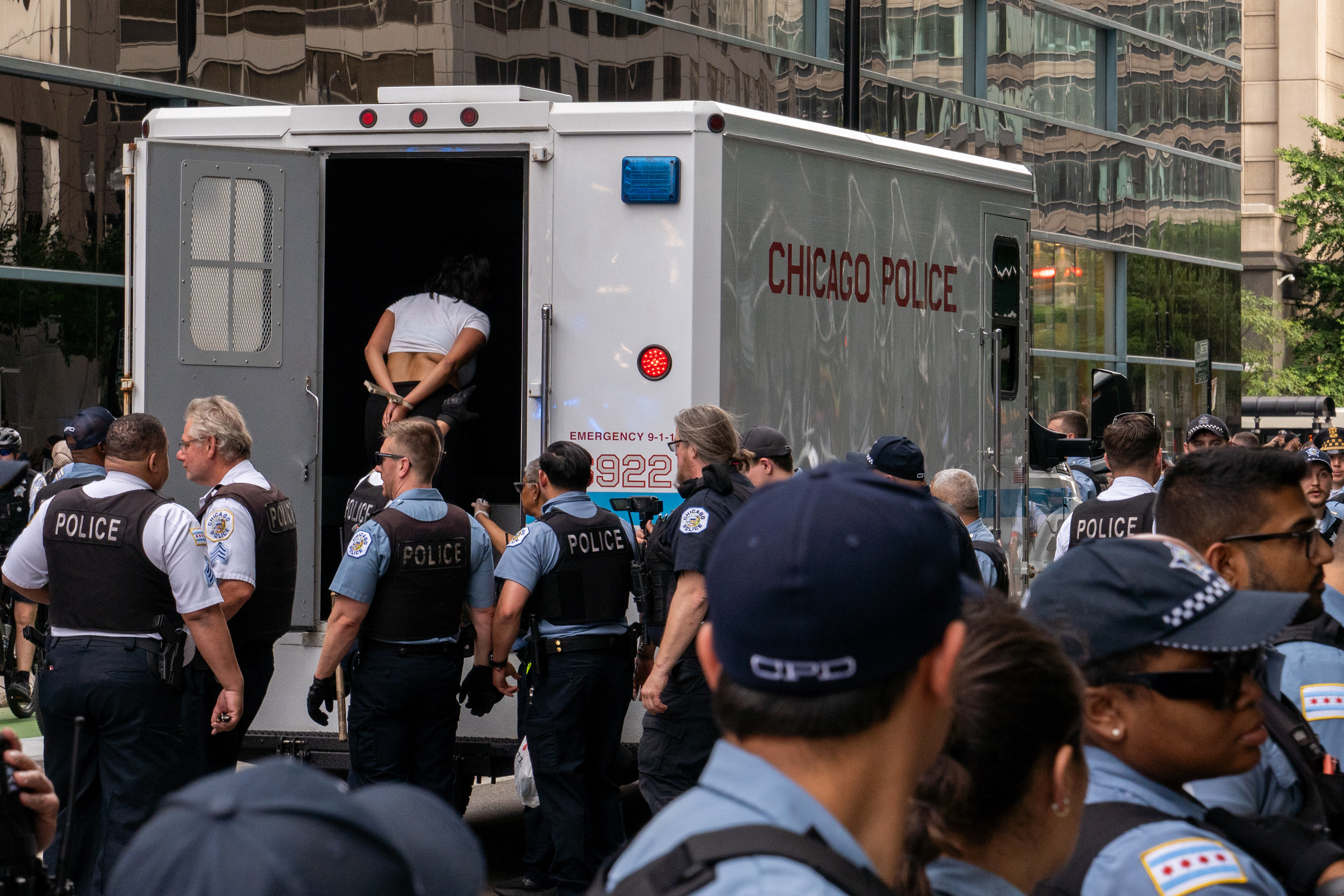 Chicago — A protester is arrested after a confrontation with police outside the Israeli consulate in Chicago, June 12, 2024.