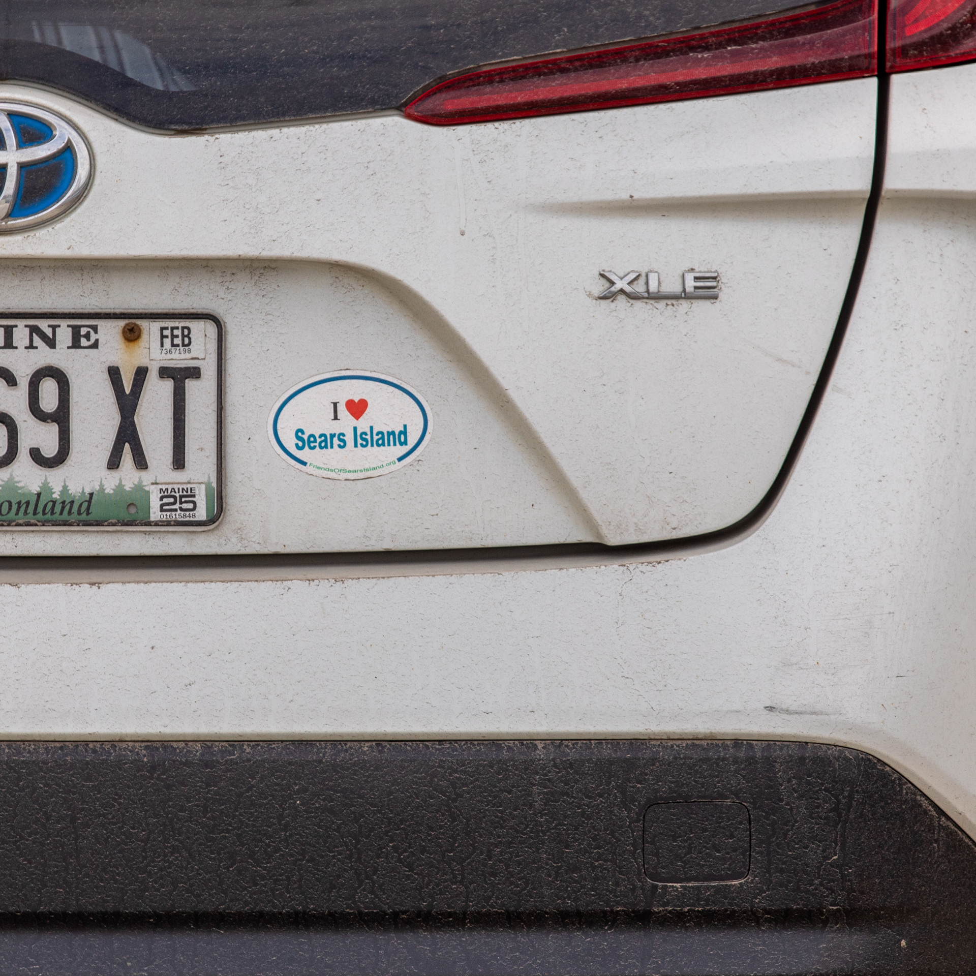 Olsen's car with an "I ♡ Sears Island sticker."